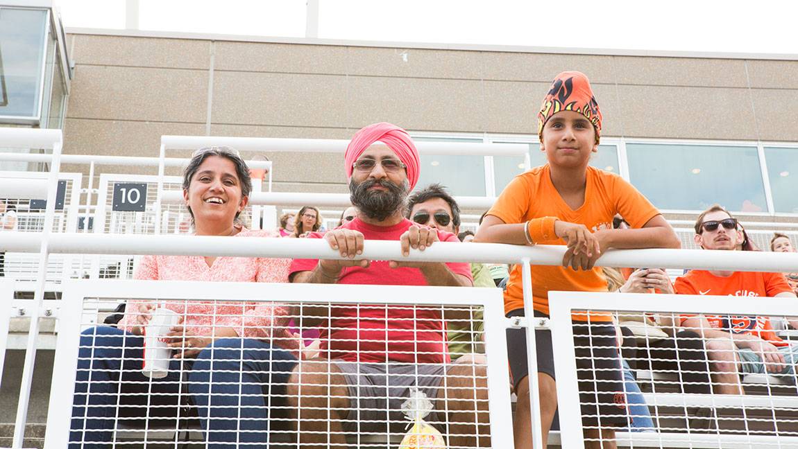 Enjoying the football game at Community and Staff Day