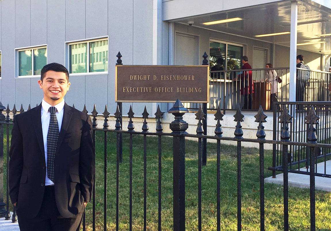 Luis Carchi stands in front of the Eisenhower Executive Office Building in Washington, D.C.