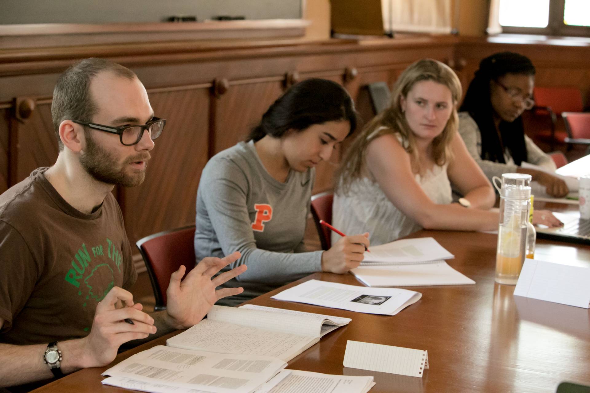 Senior William Lathrop (left) in the class, "White Hunters, Black Poachers" being taught by Jacob Dlamini 