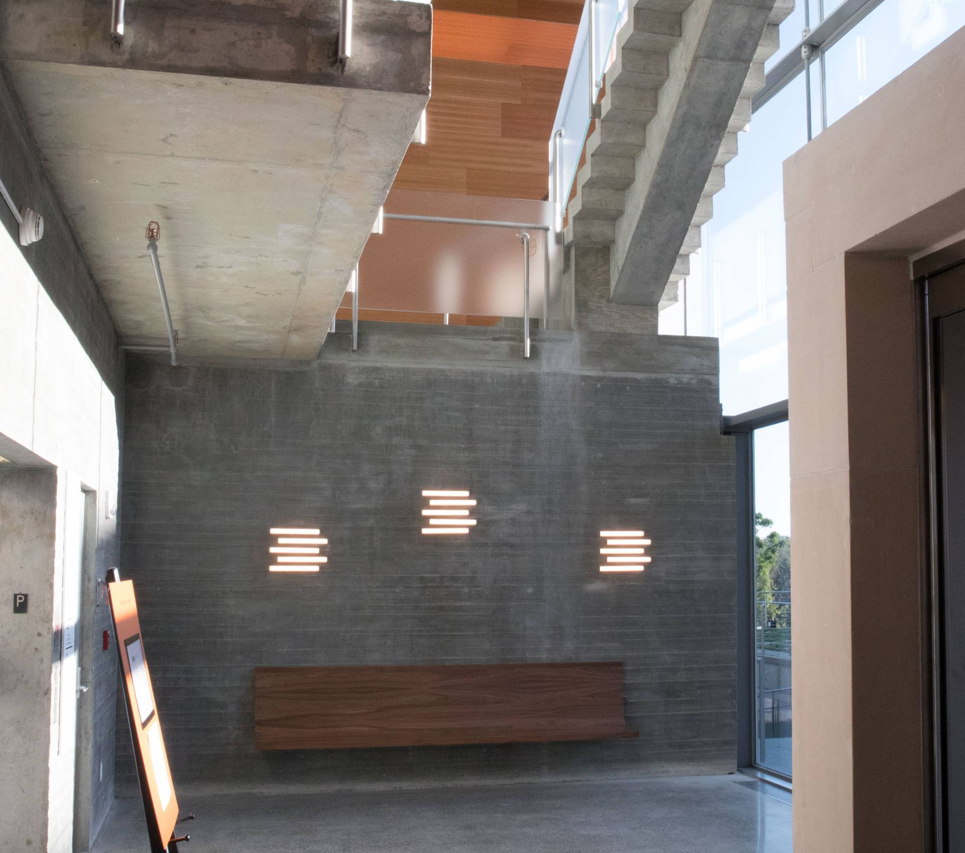 Music staff light fixtures on wall in Lewis Arts complex