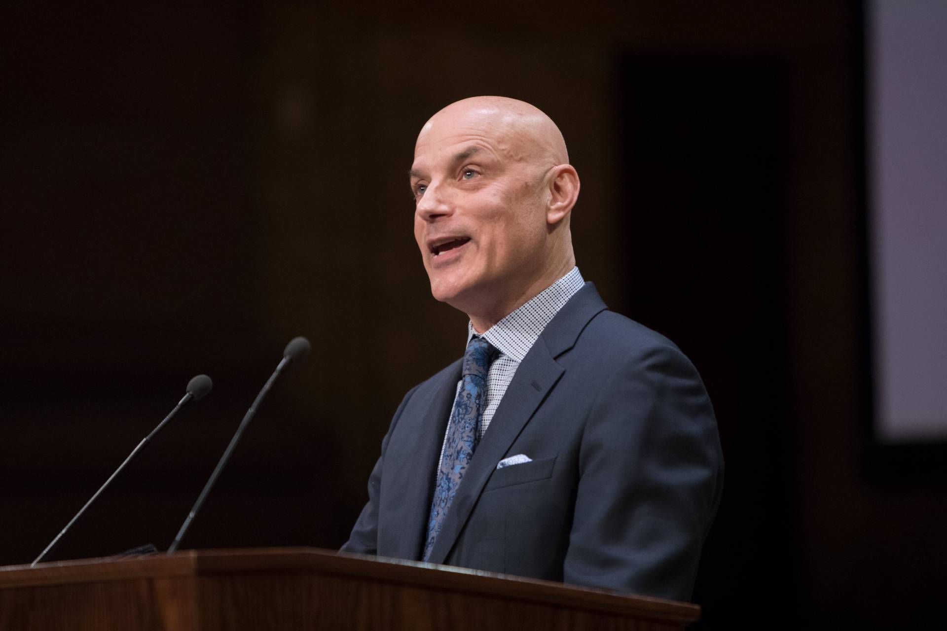 Daniel Mendelsohn speaking at podium