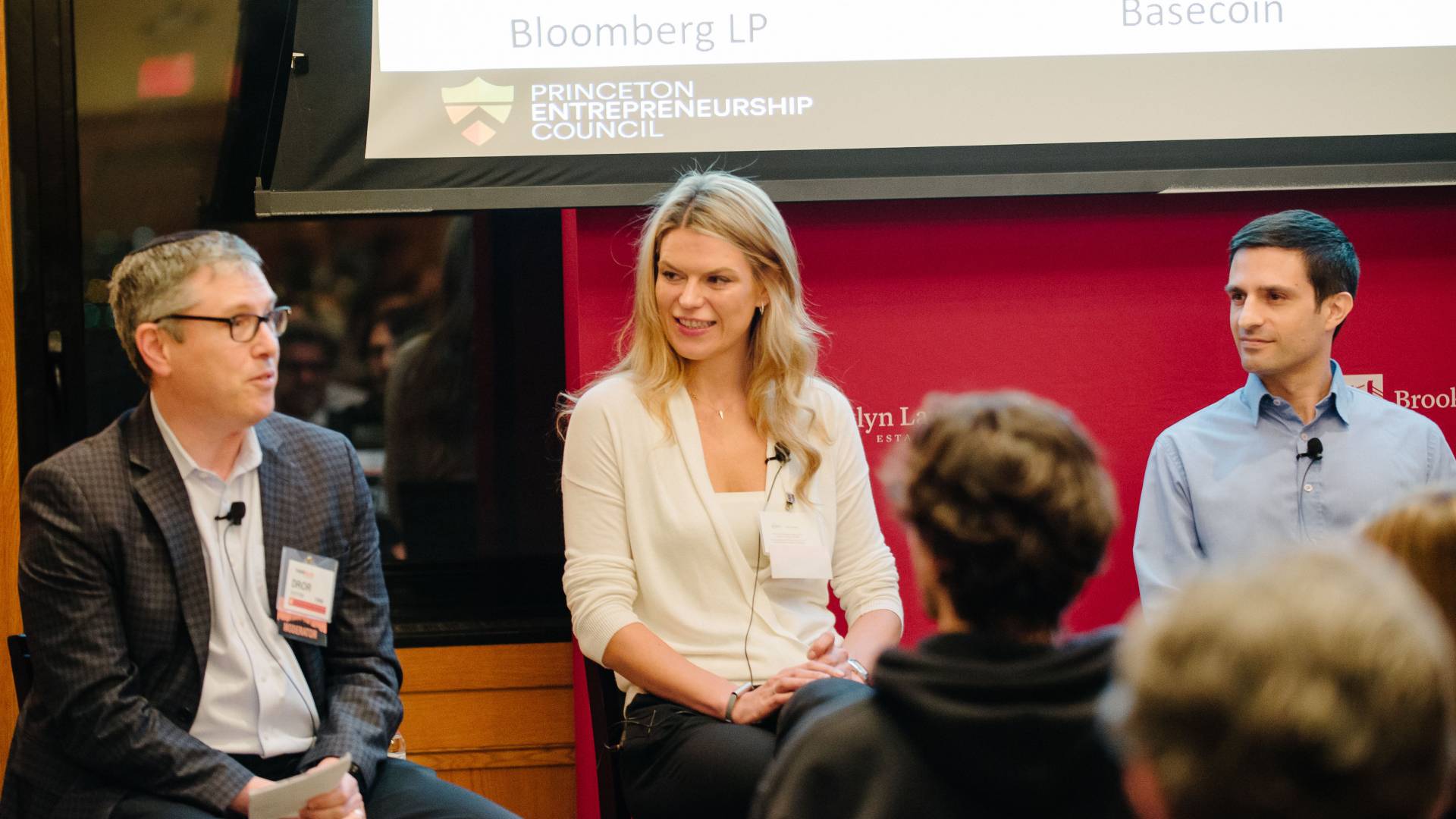 From left: Moderator Dror Futter, Class of 1986, speaks to the TigerTalks audience, as Katya Chupryna, Class of 2008, and Barona look on.