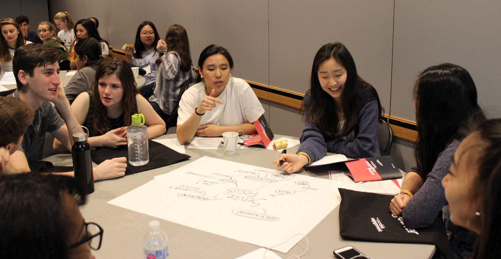 Students discussing Service Focus program during lunch