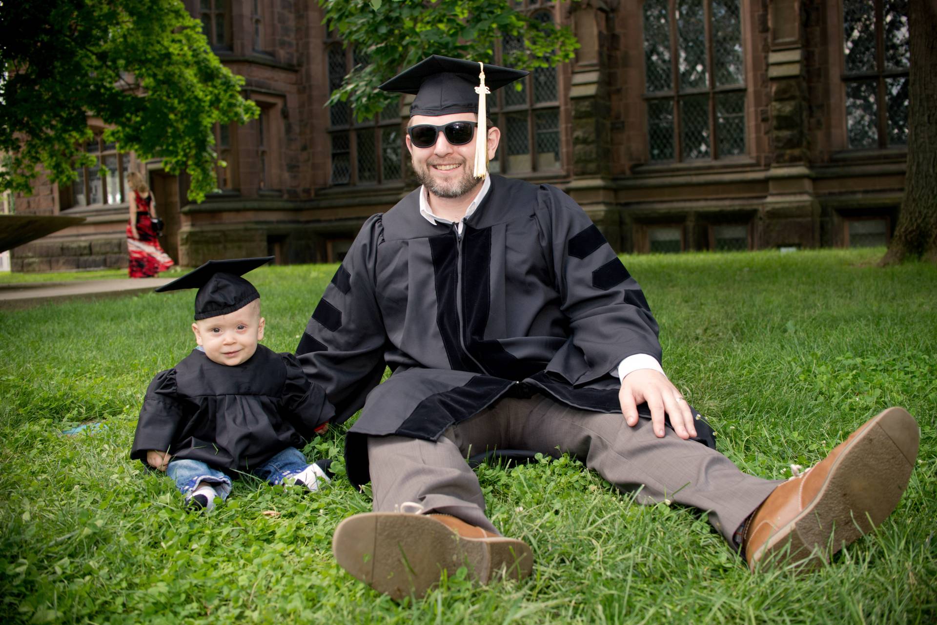 Geoff Purdum sits with his son