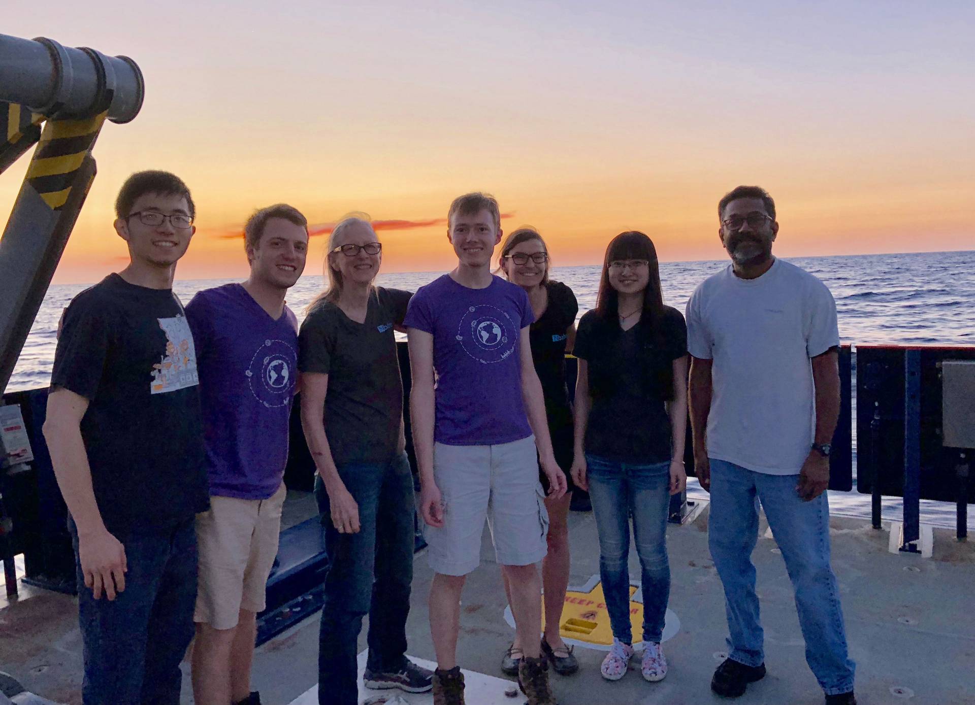 Bess Ward and members of her lab standing on deck of ship