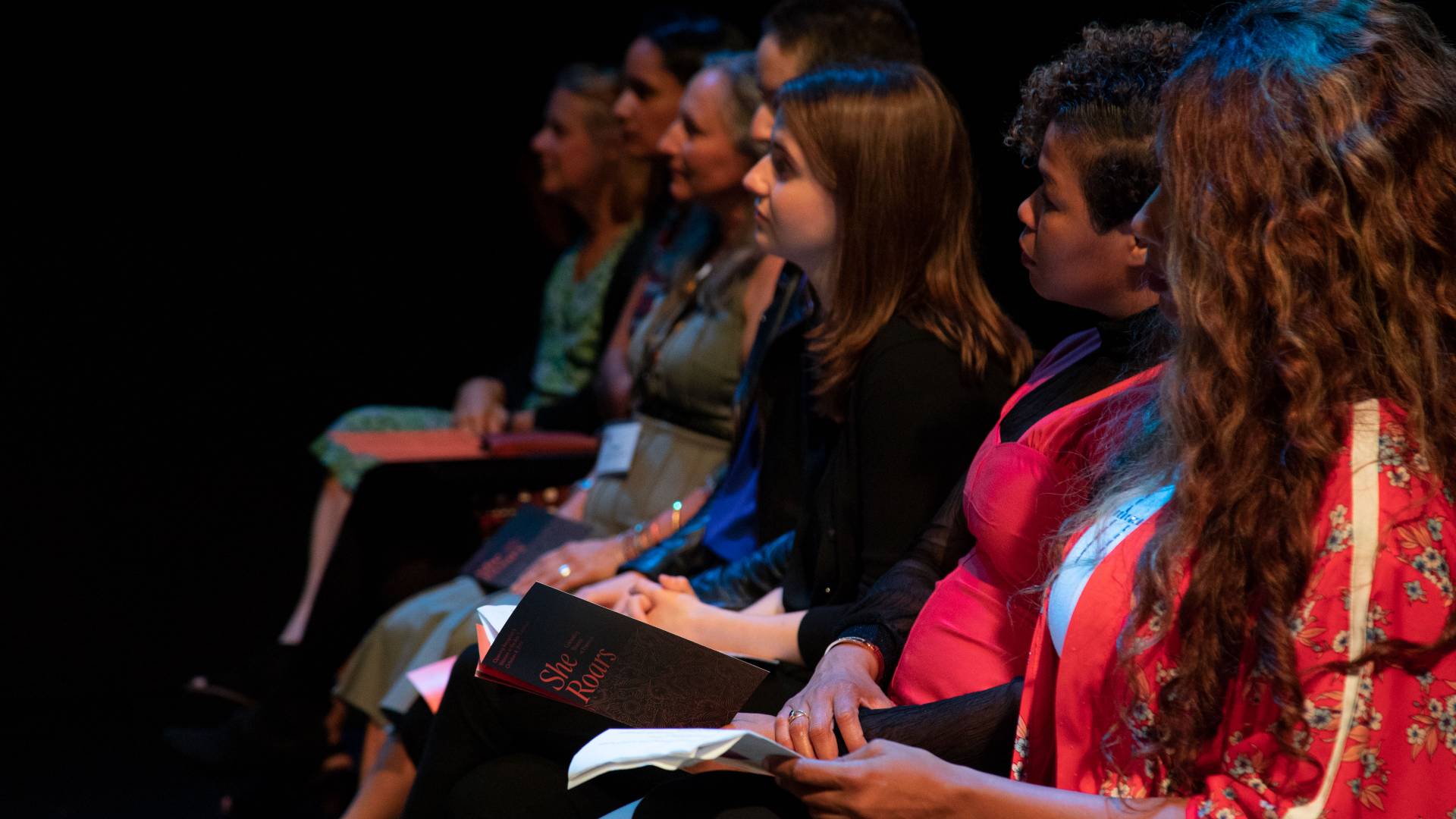Audience listening during arts showcase performance