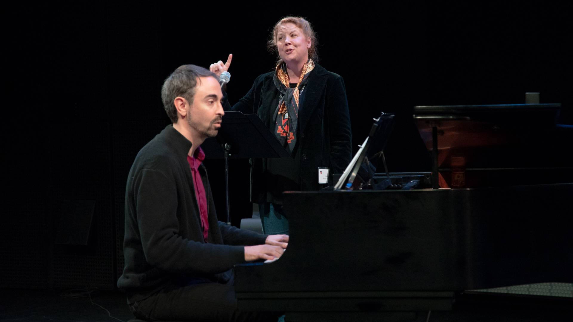 Cara Reichel singing and Peter Mills at the piano