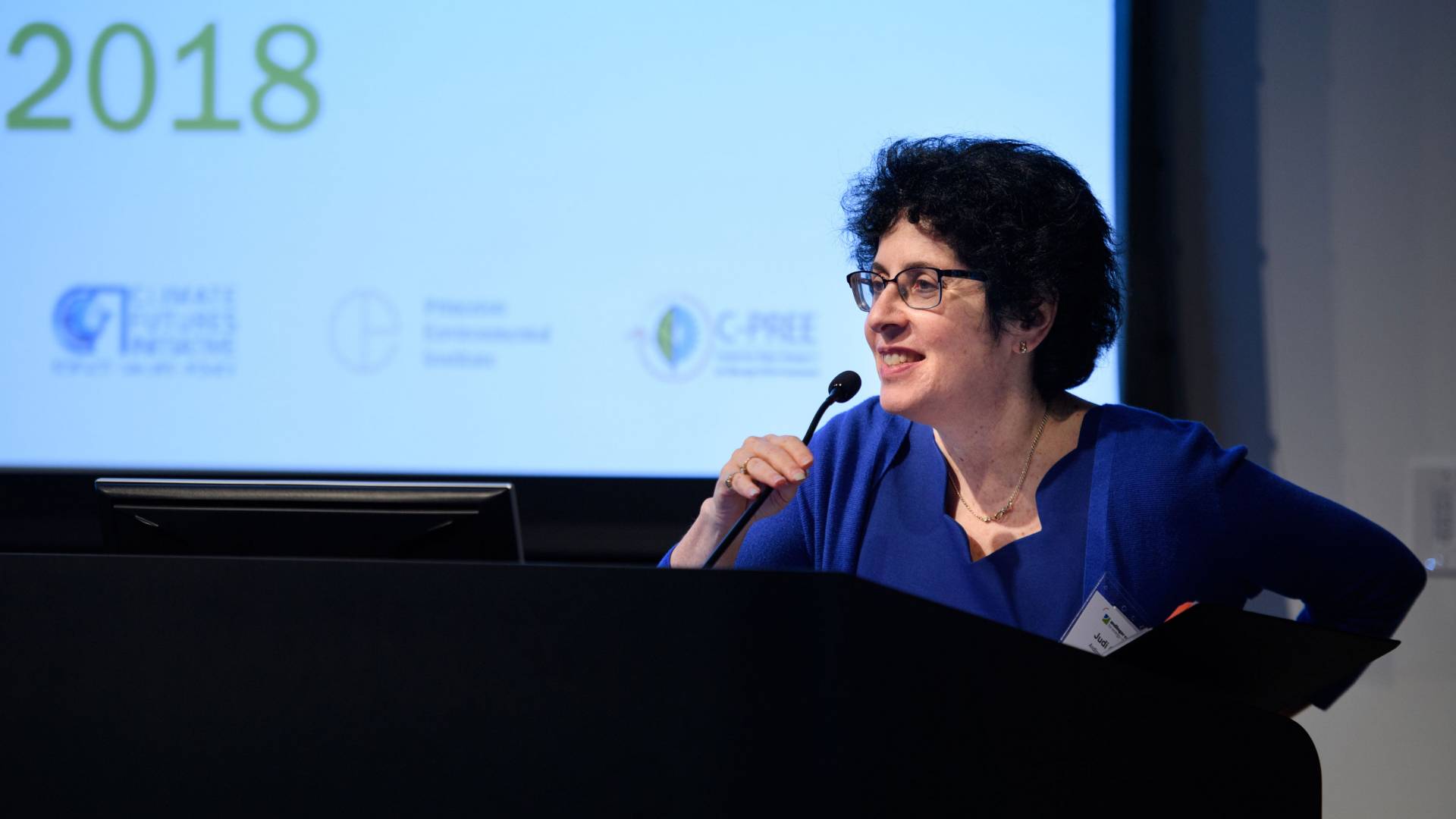 Judi Greenwald at podium