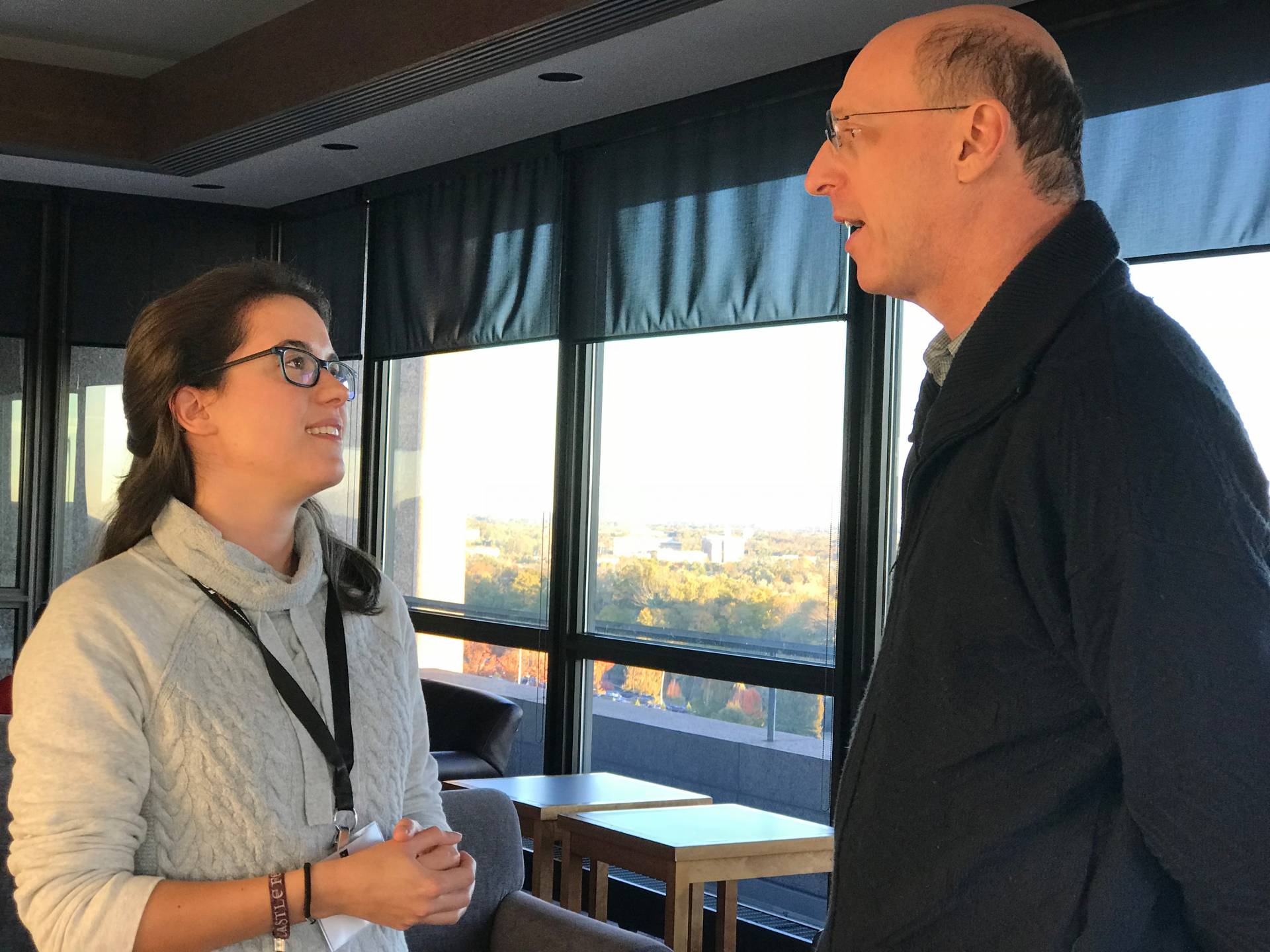 two people speak to each other