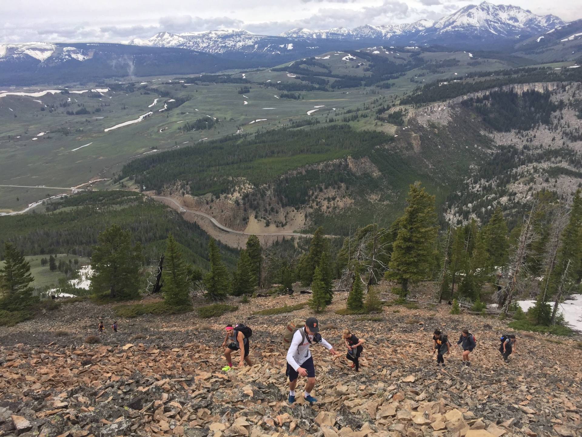 Students climbing up scree