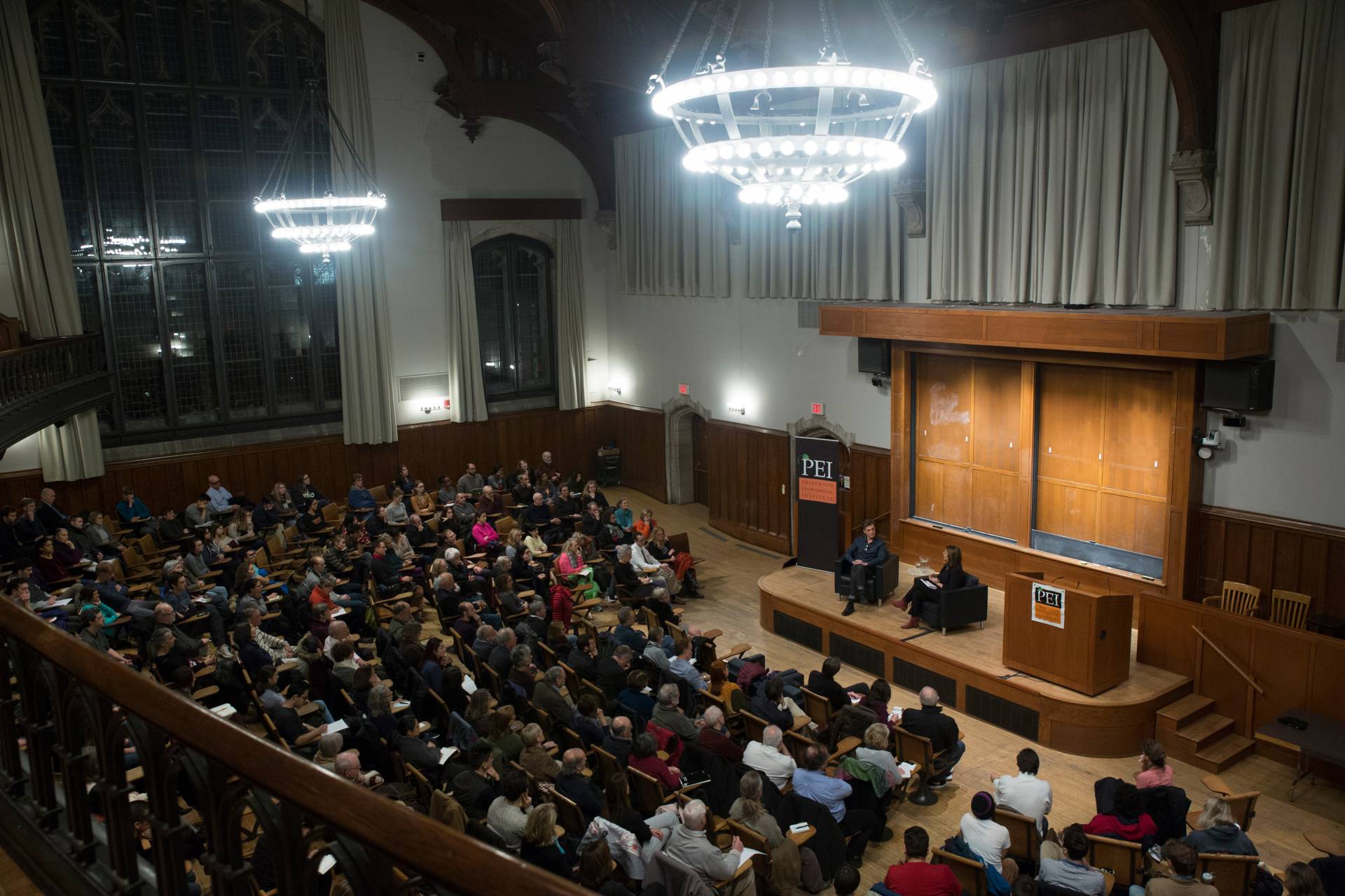 A crowd sits in McCosh 50