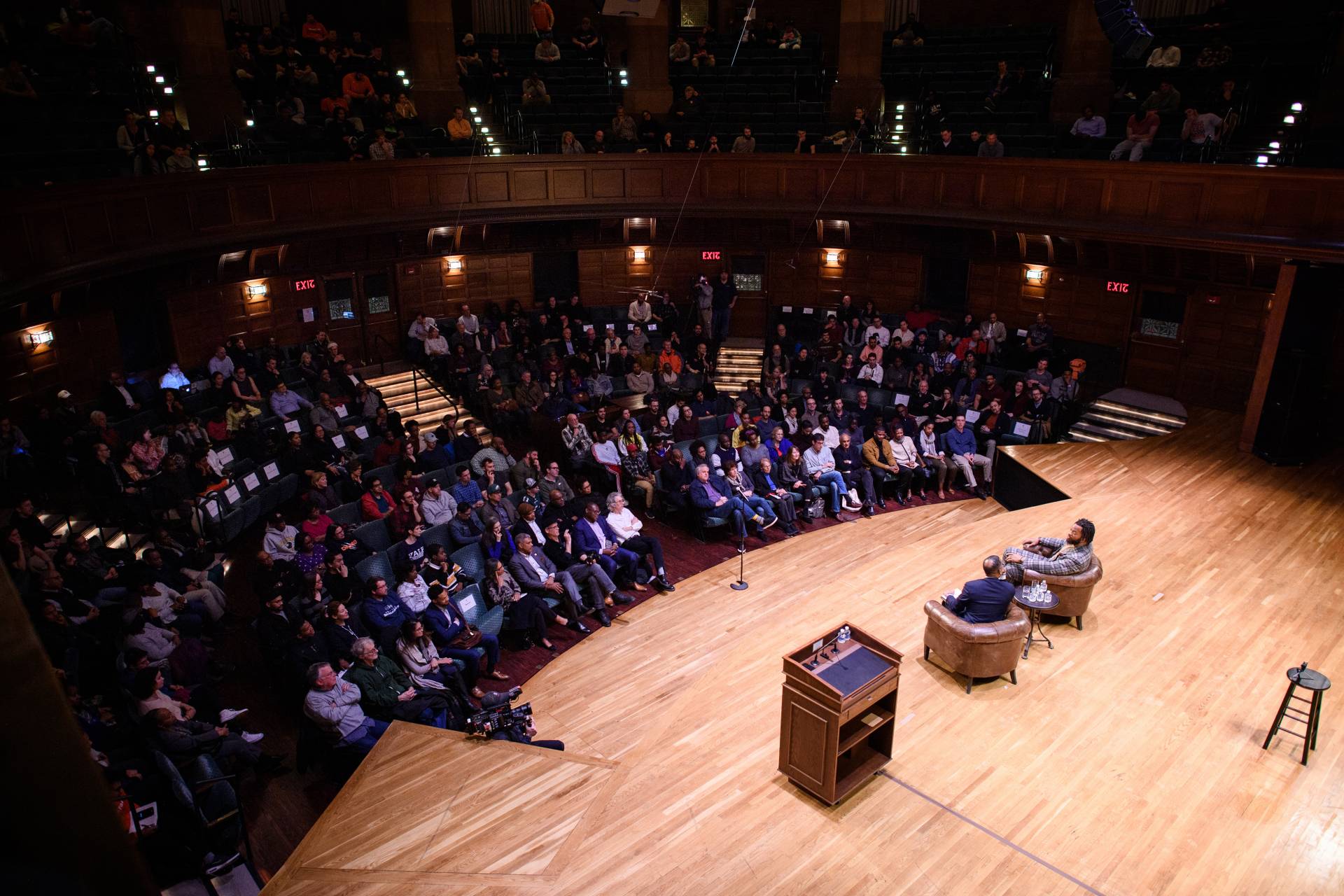 Michael Bennett, Eddie Glaude in front of audience