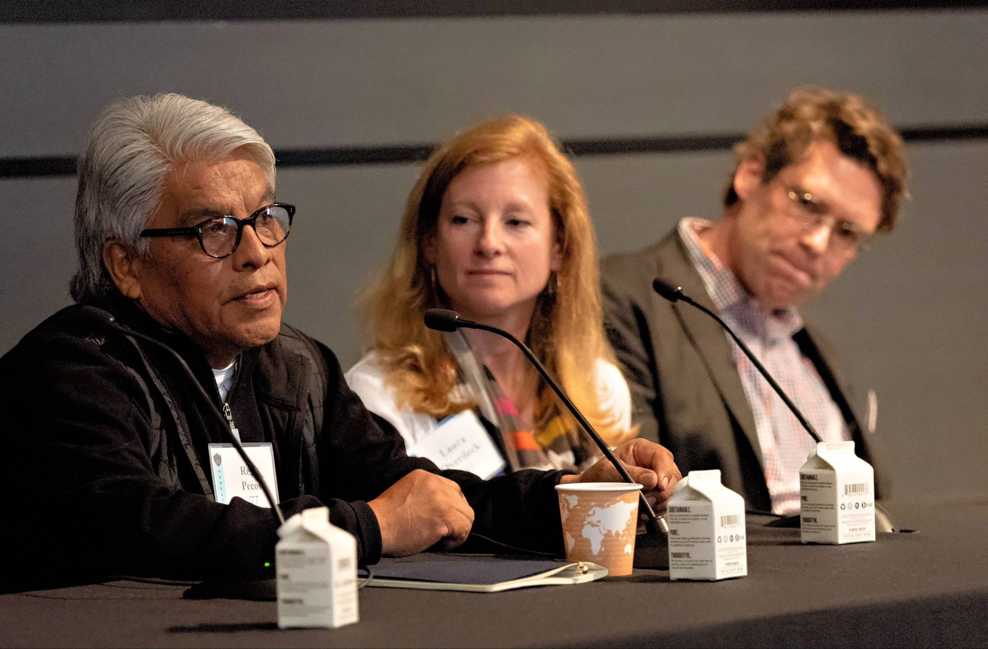 Regis Pecos speaks on a panel