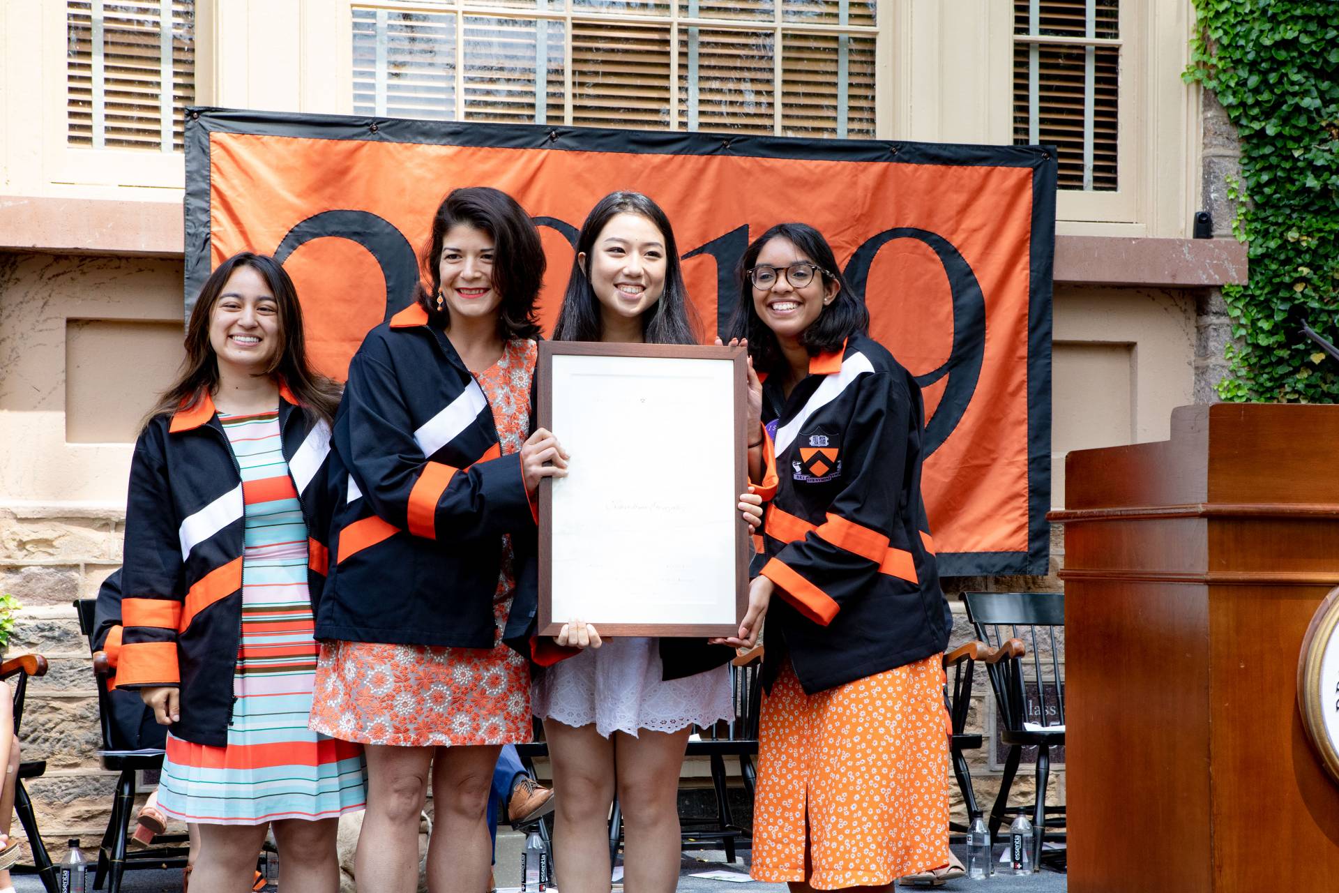 Seniors present Khristina Gonzalez with an award