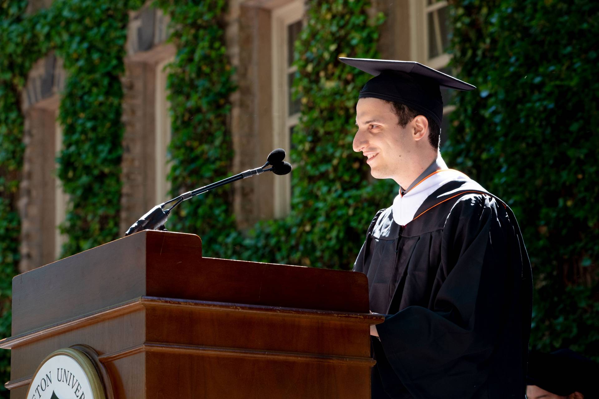 Rafail Zoulis gives his address at the podium