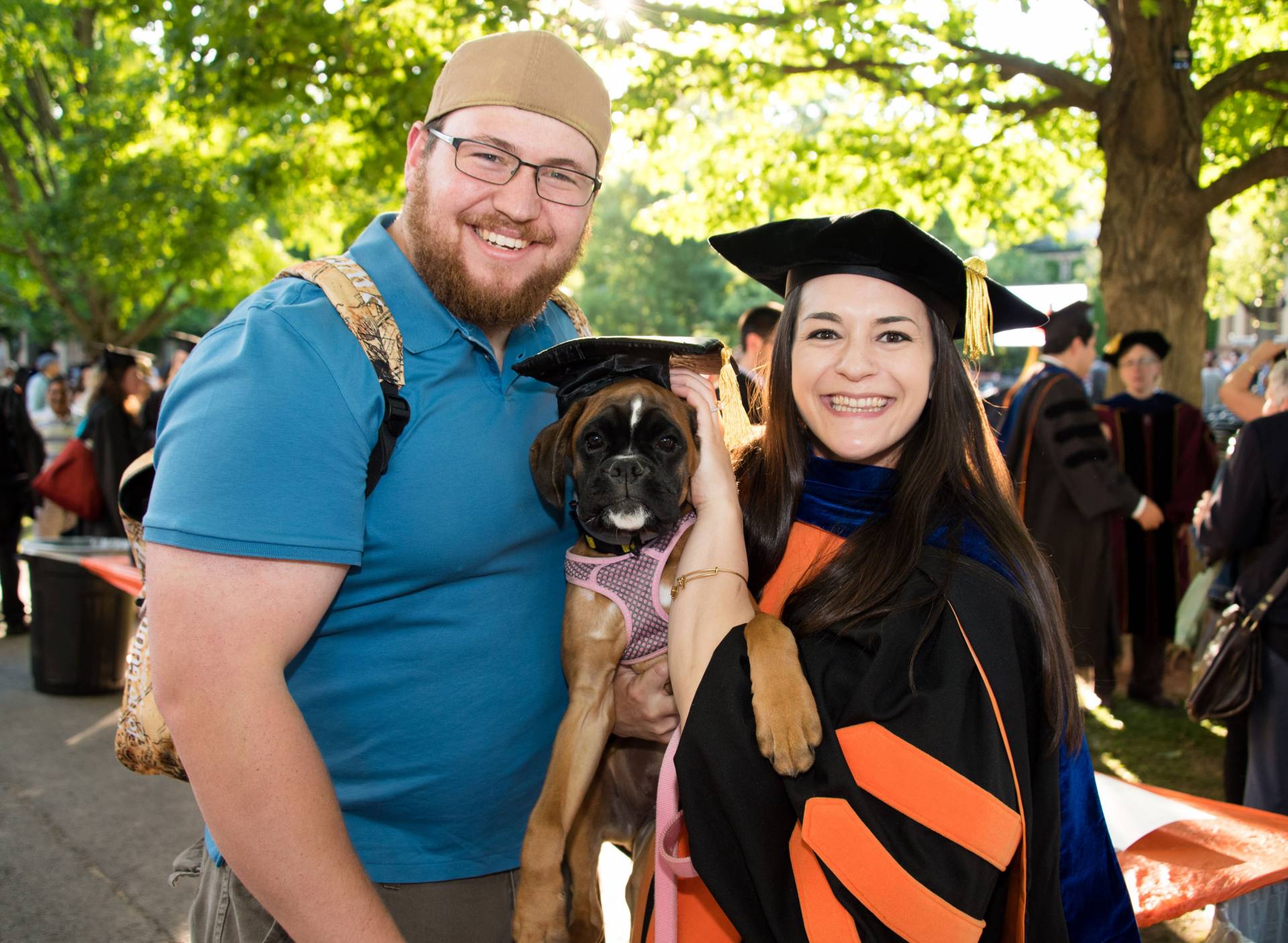 Student posing with dog