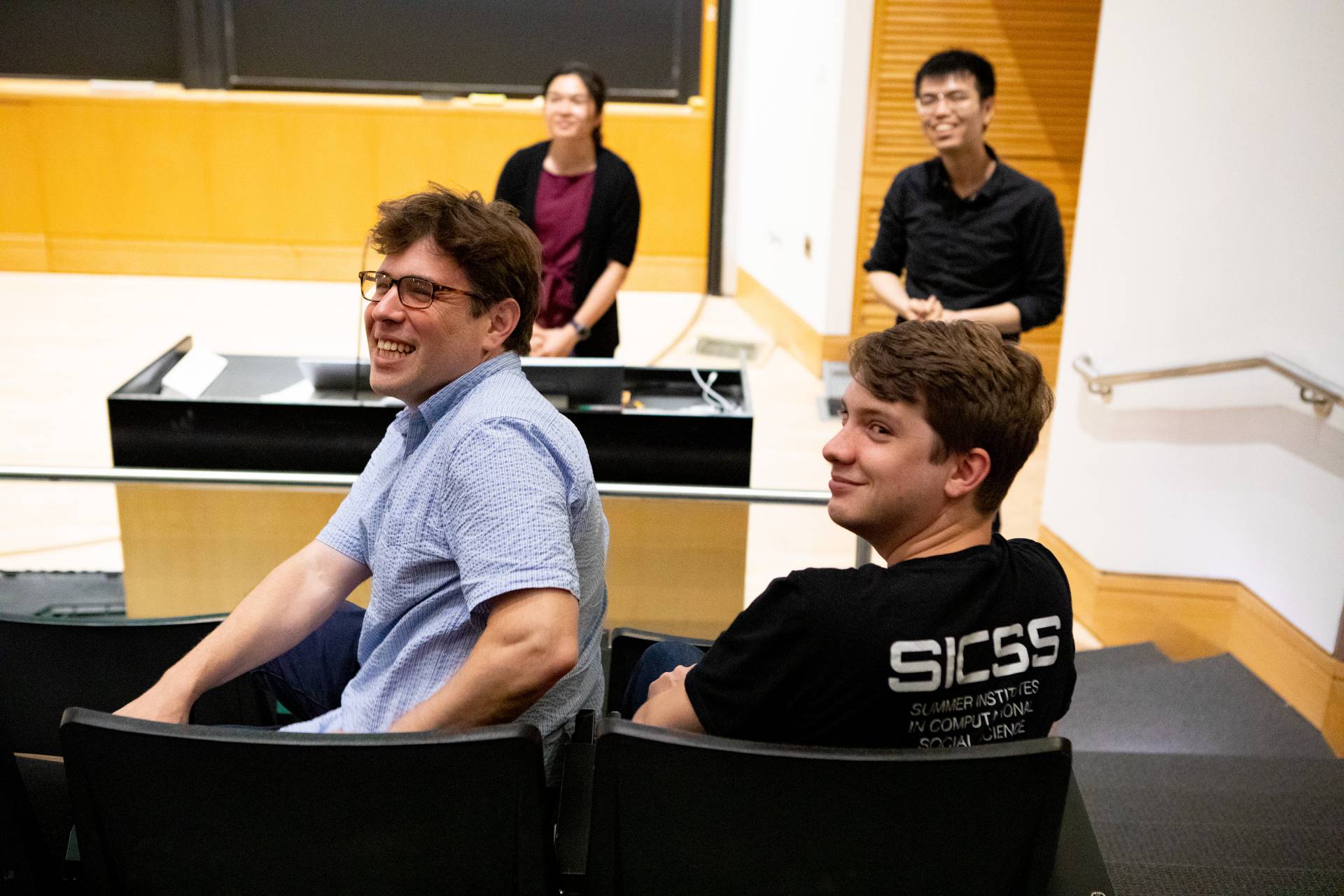 A class listens to a presentation