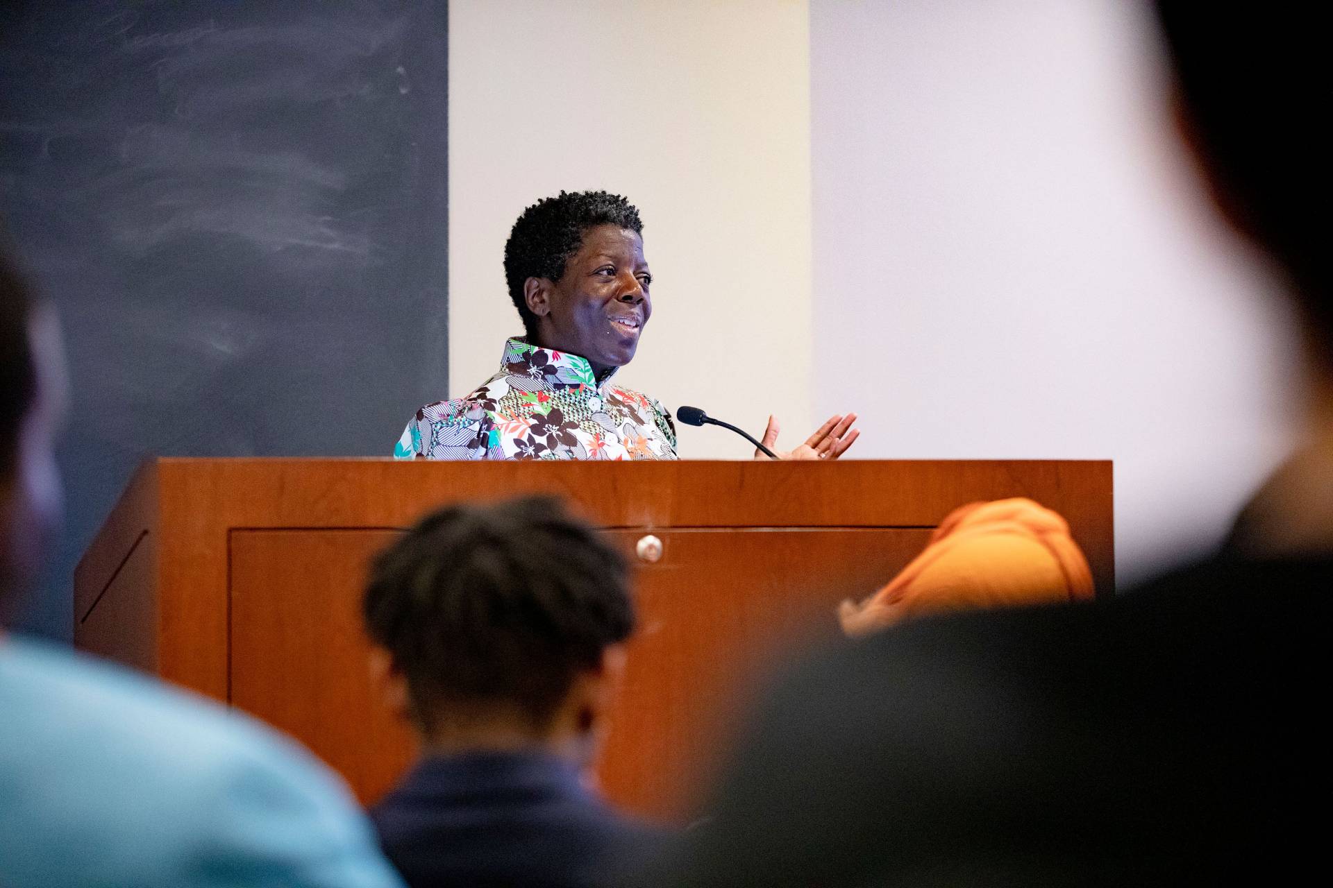 Thelma Golden, director and chief curator of The Studio Museum in Harlem, stands at a podium
