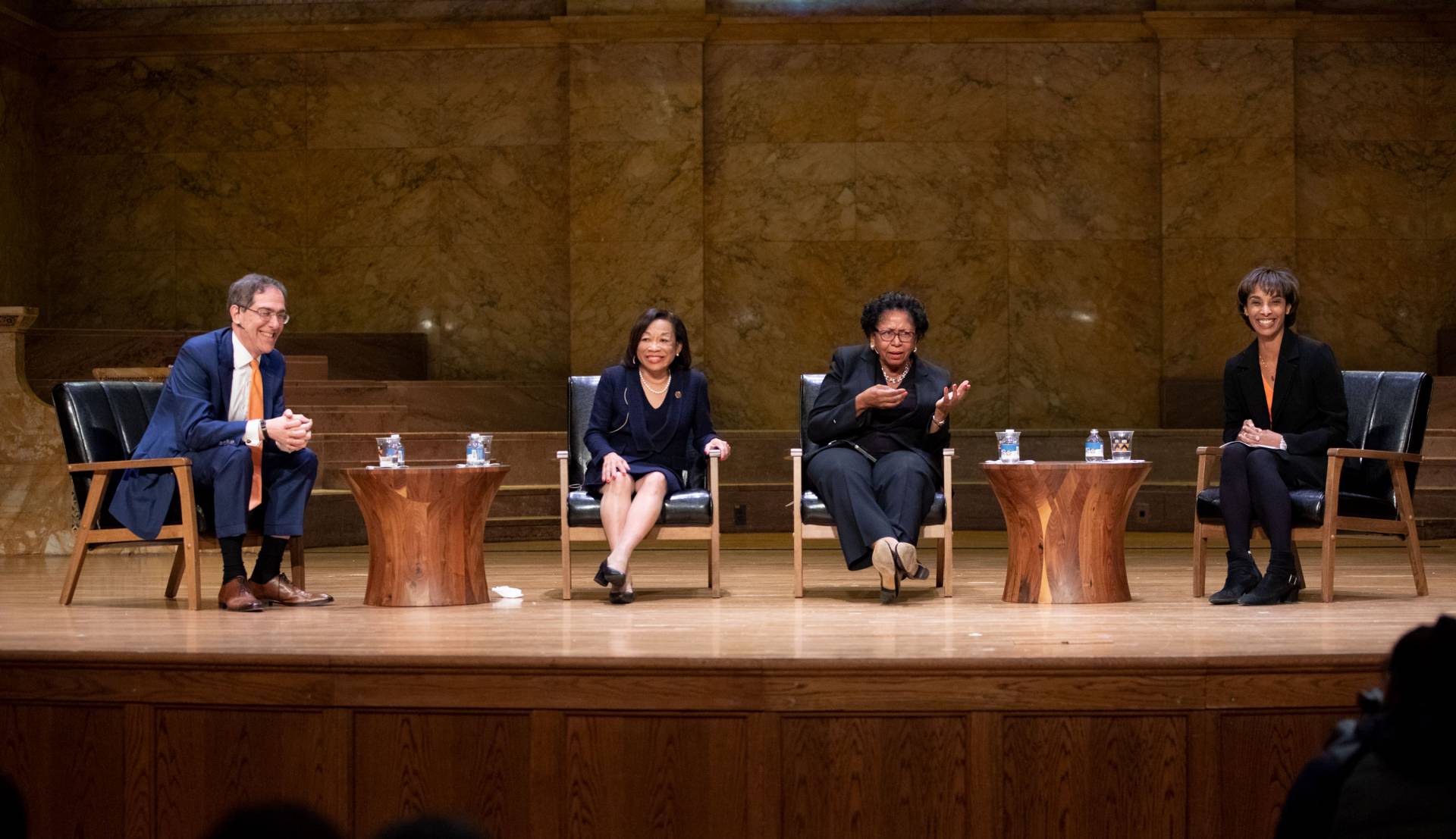 Higher Ed panelists on stage