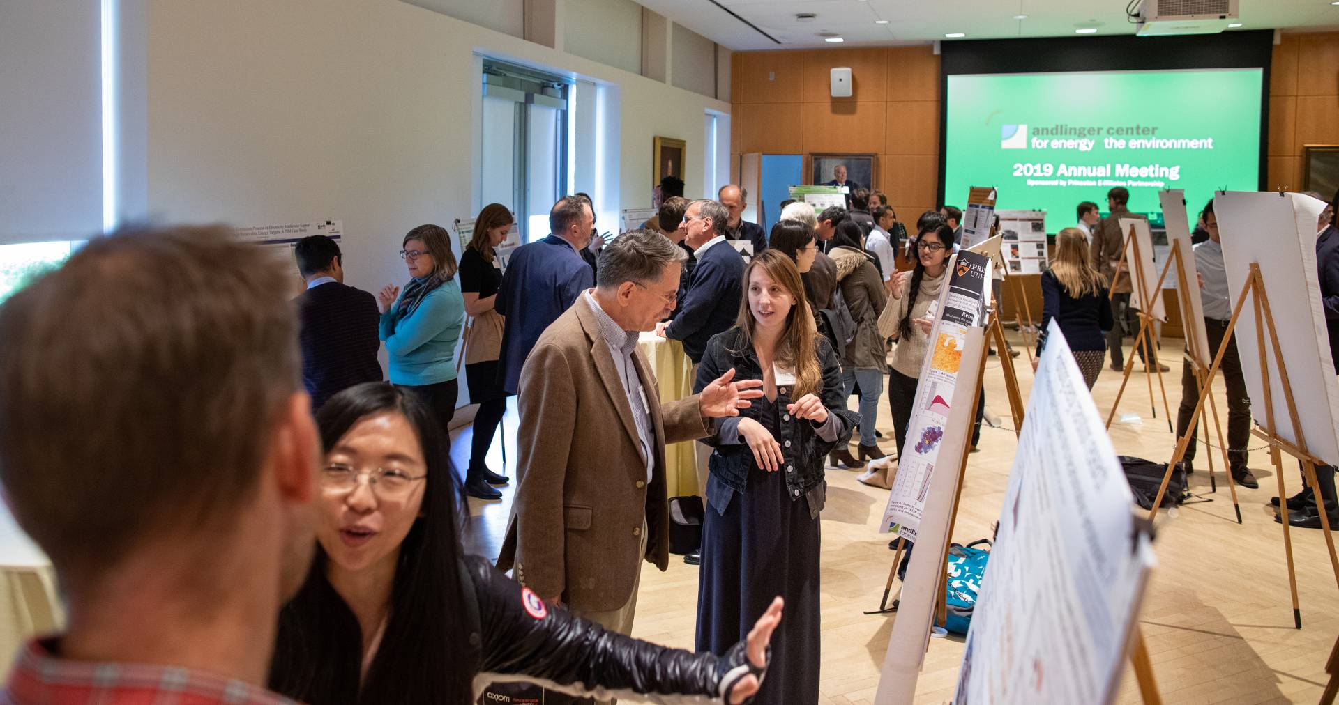 People presenting research posters