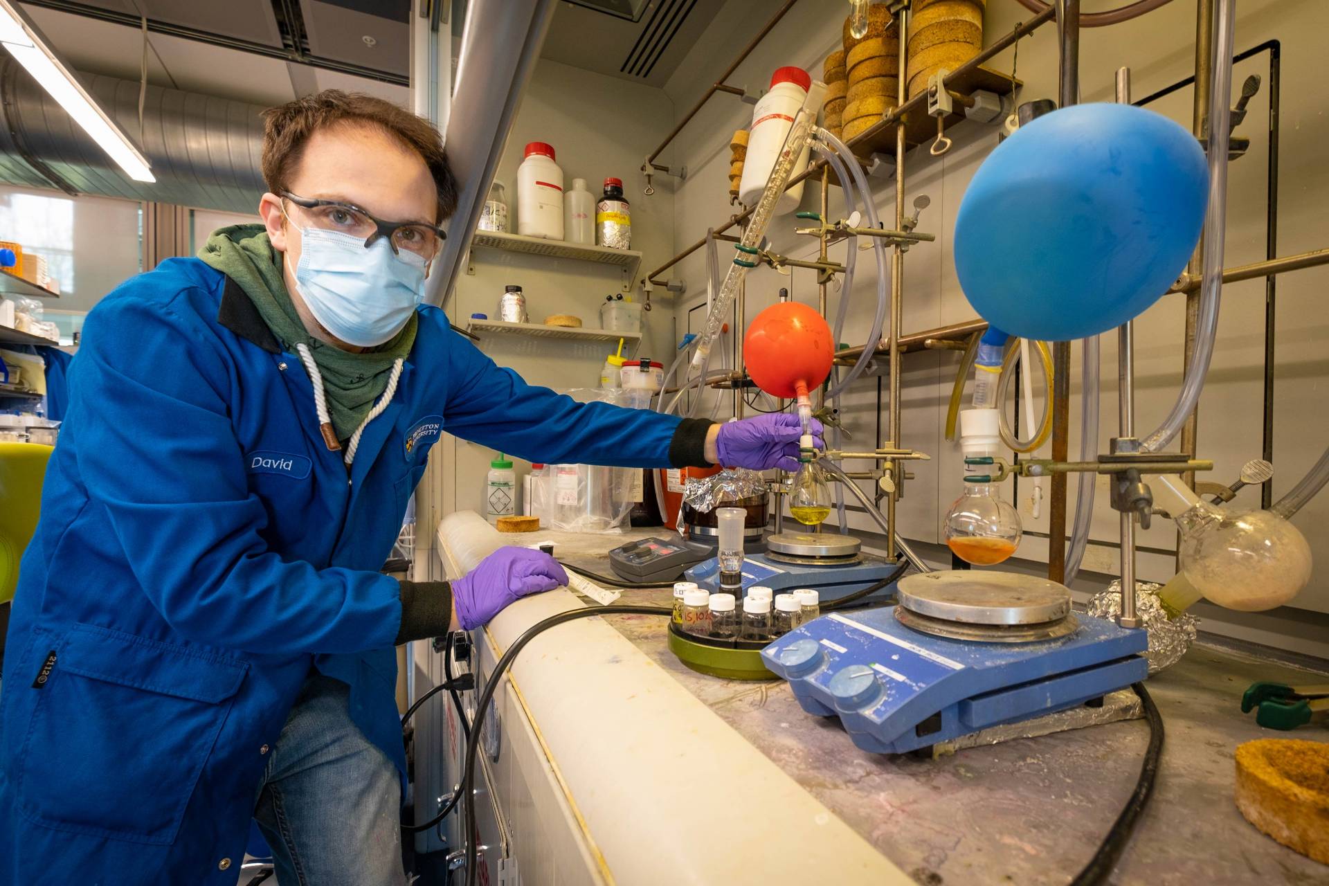 A postdoctoral student works in a chemistry lab