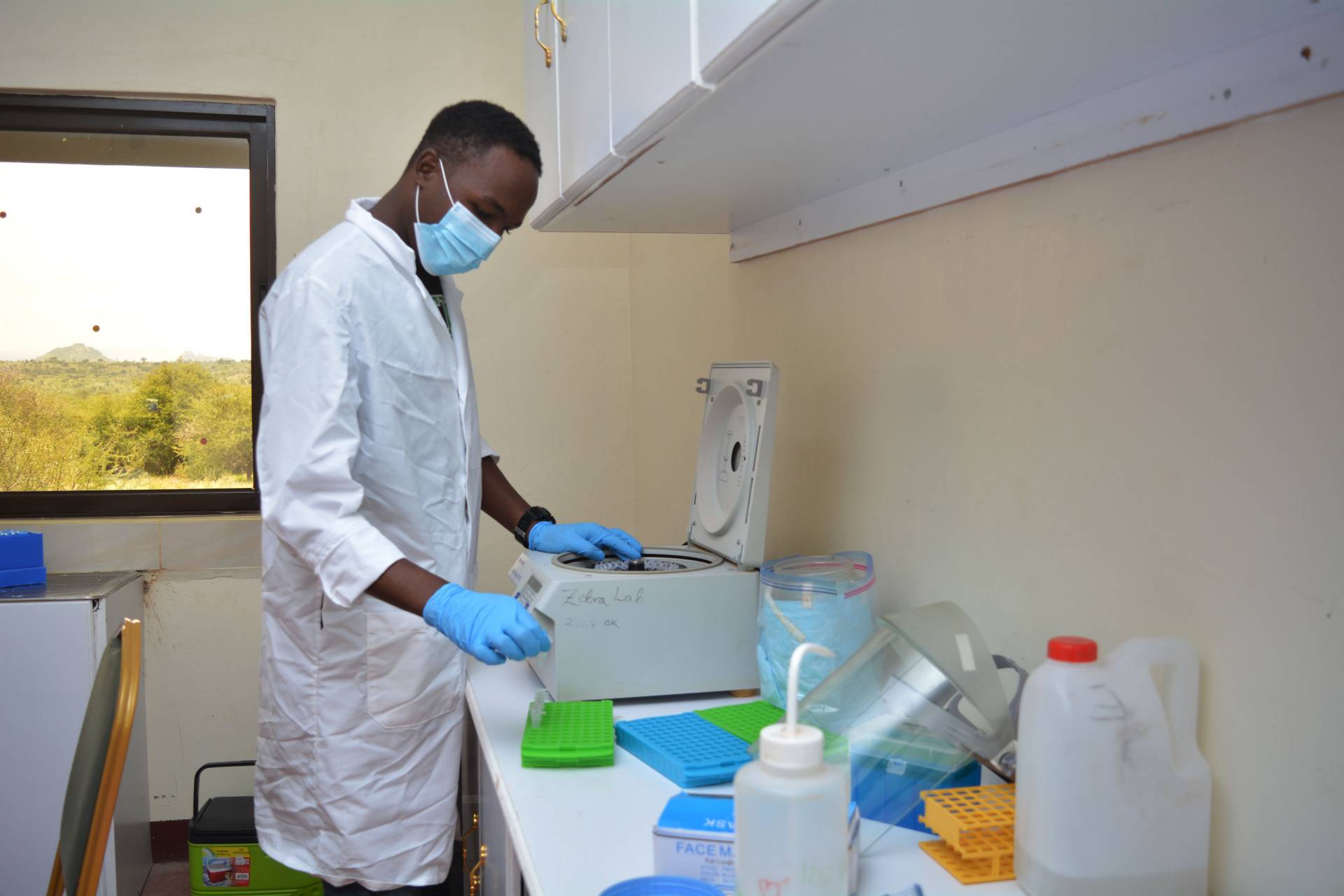 researcher with a centrifuge