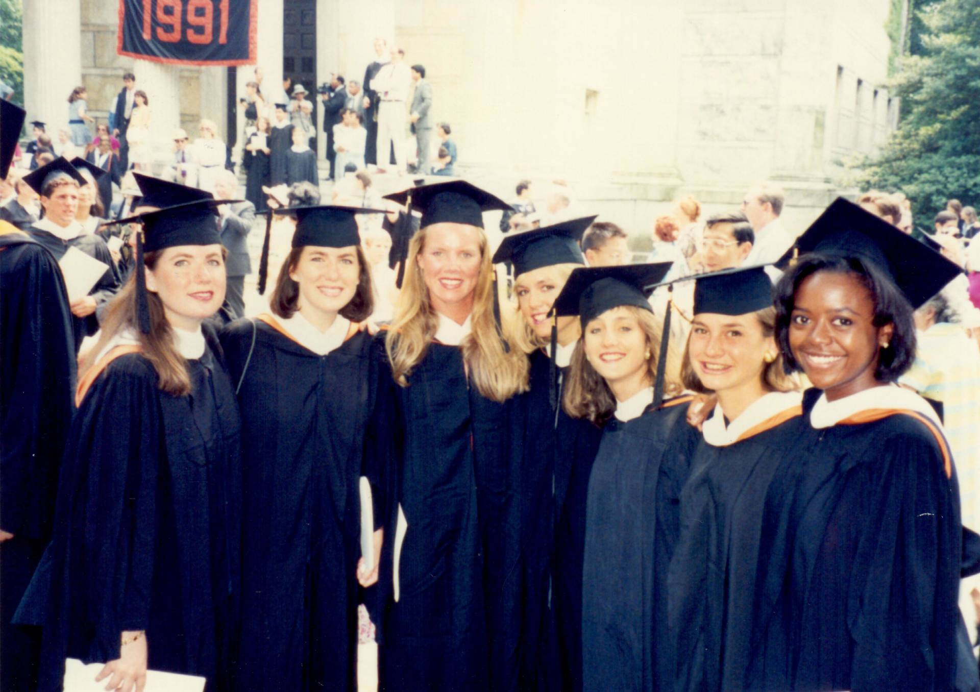Mellody Hobson poses with a group of friends at Commencement