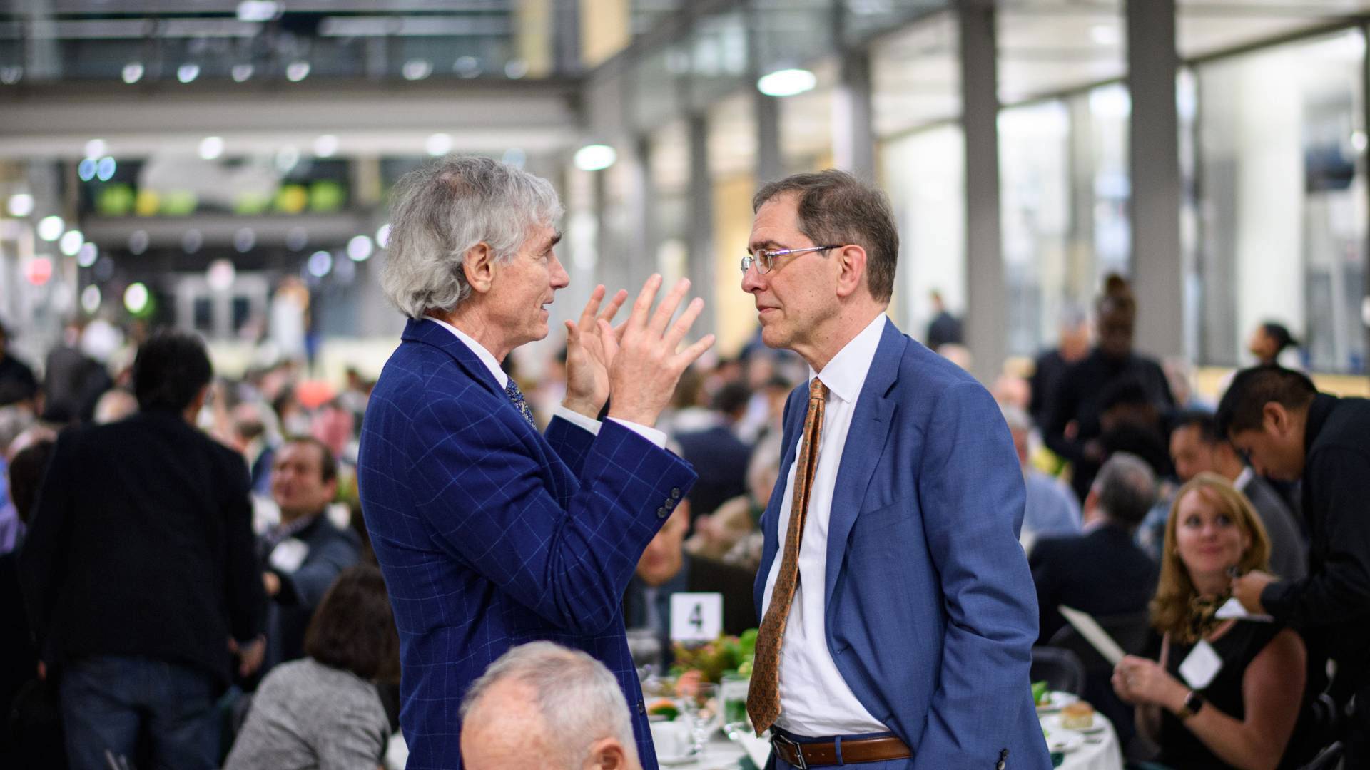 Tom Barron speaks to President Eisgruber during the PEI 25 Forum event