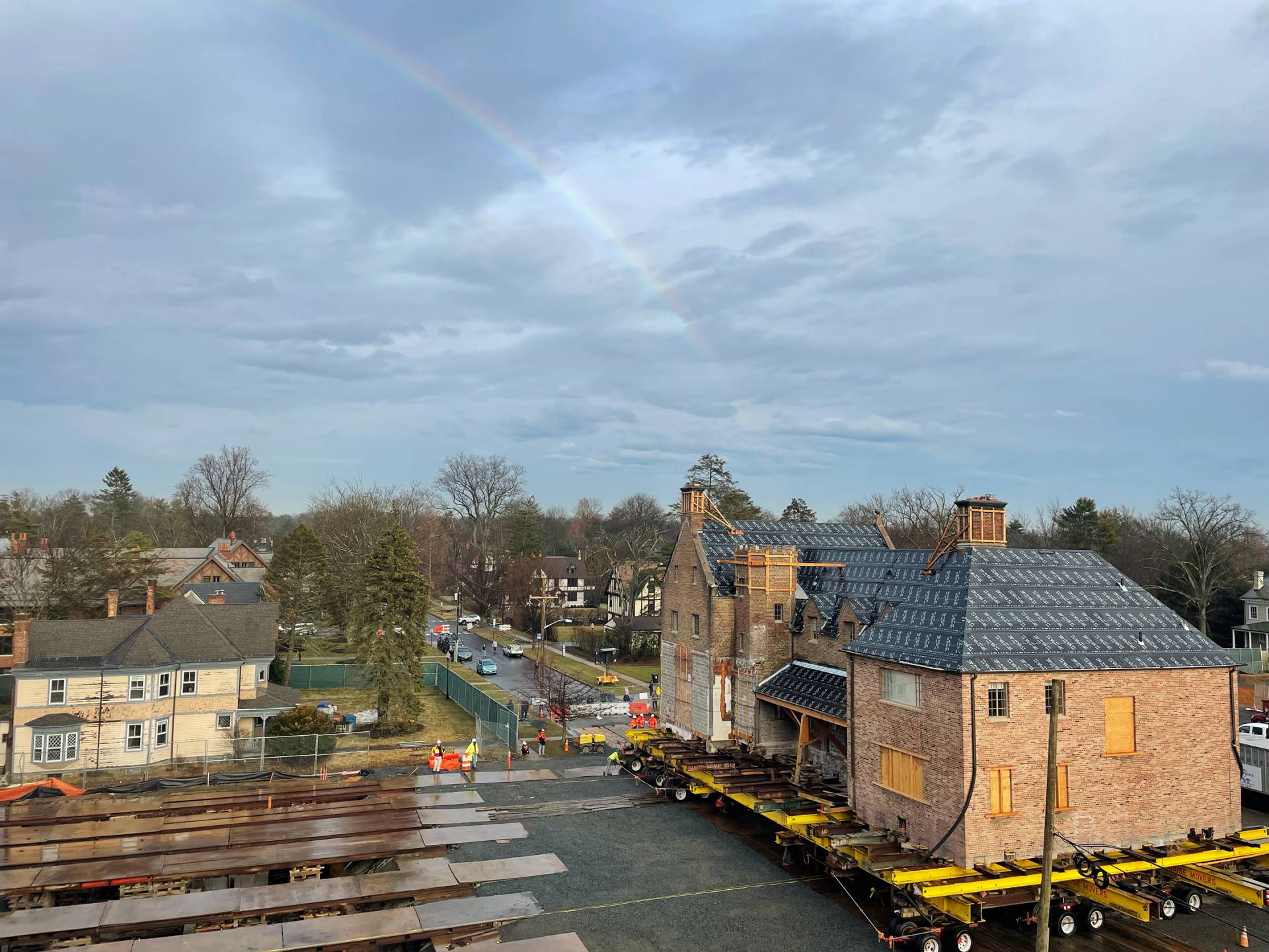 A rainbow appeared over the building during it's travels across the street