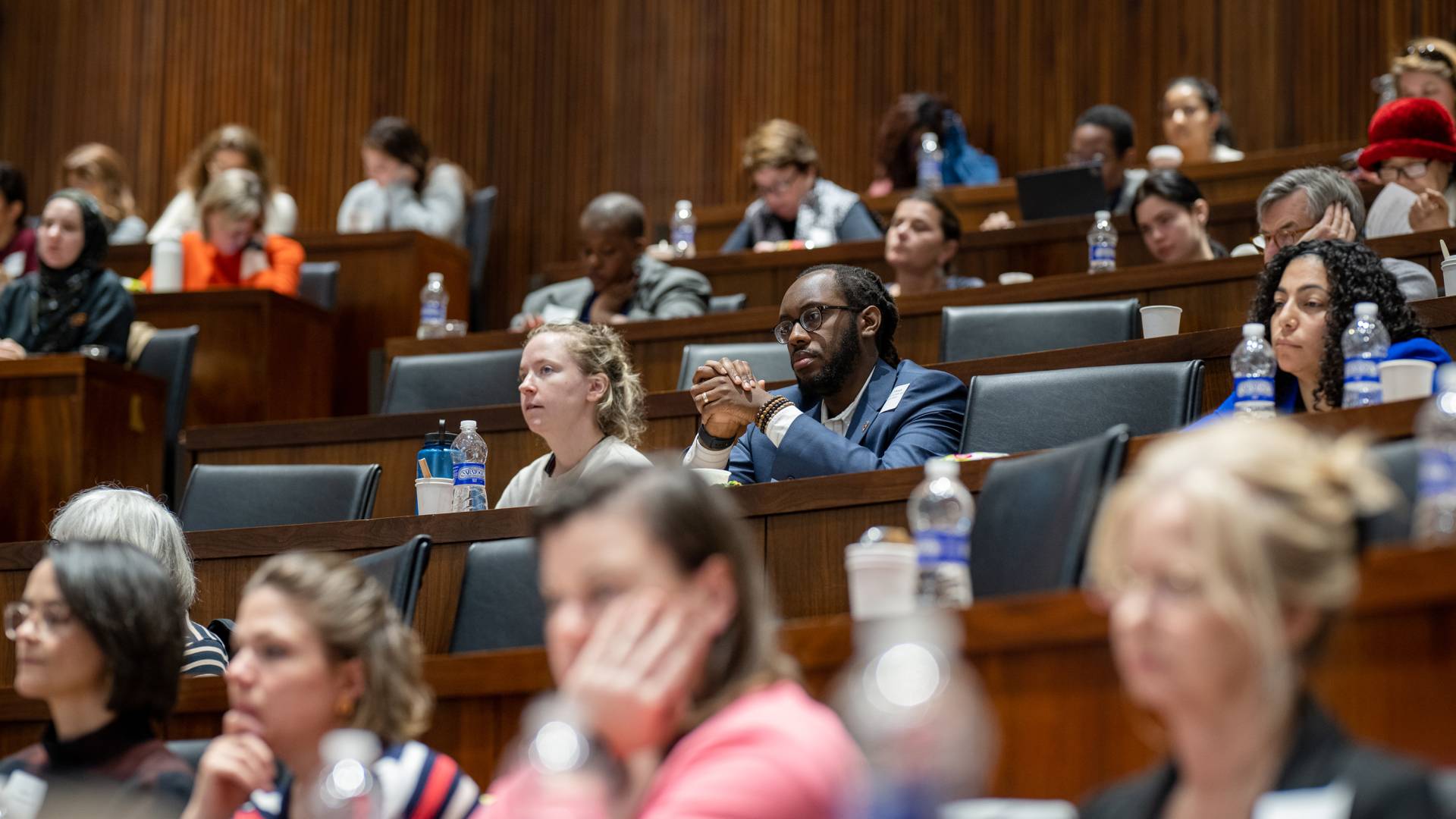 Audience members listen to panelists at the SPIA in NJ event