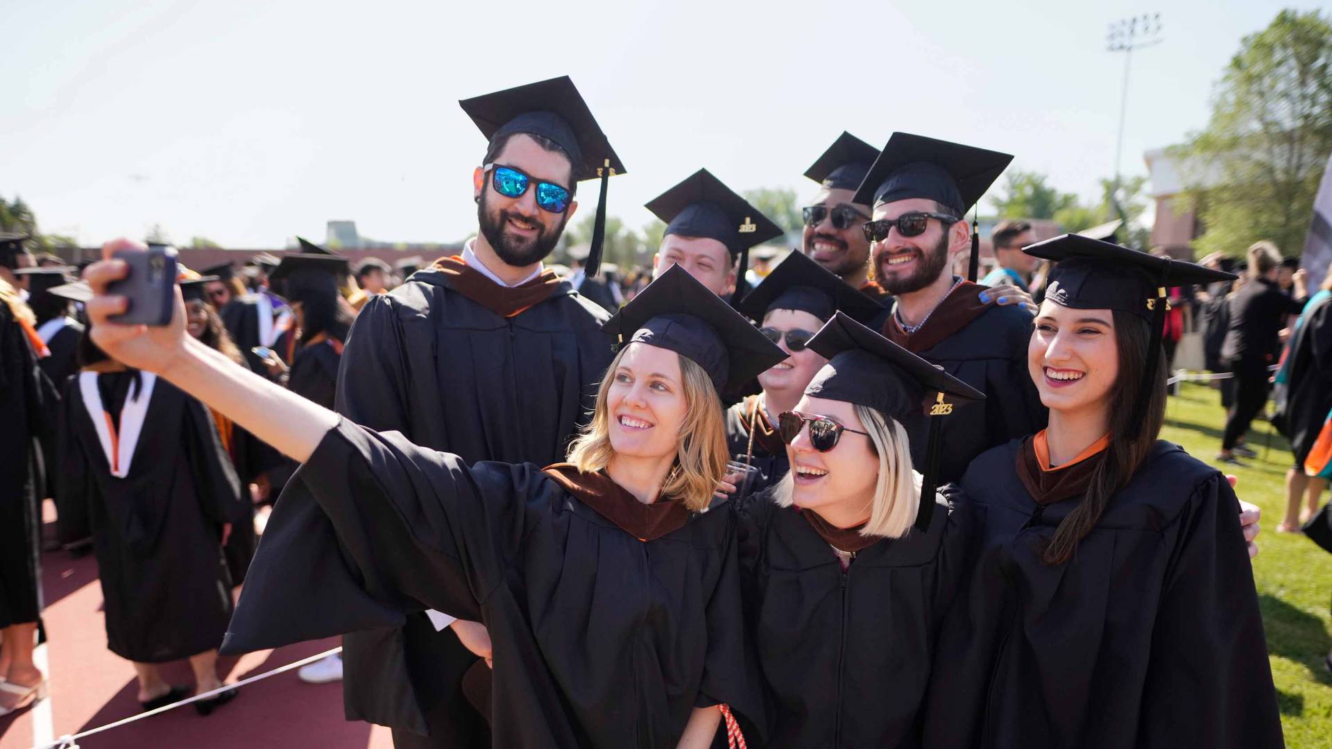 Graduating students taking a selfie