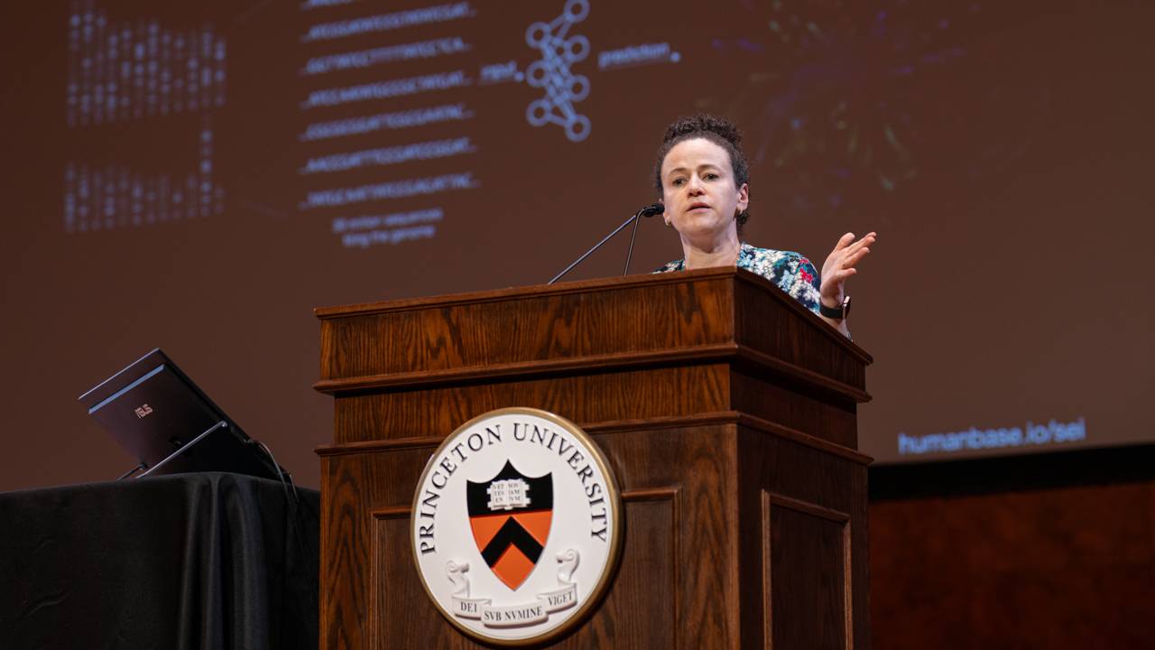 Olga Troyanskaya in front of the projections of gene diagrams
