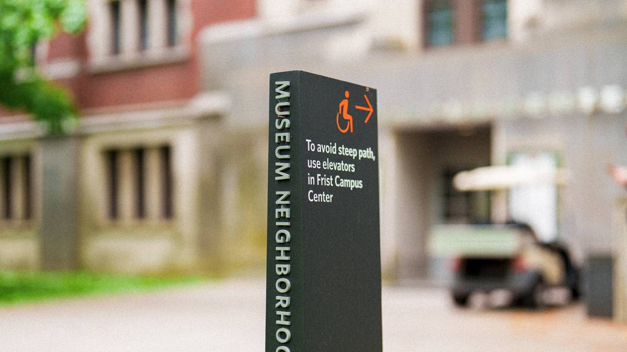 Exterior accessibility sign next to a building