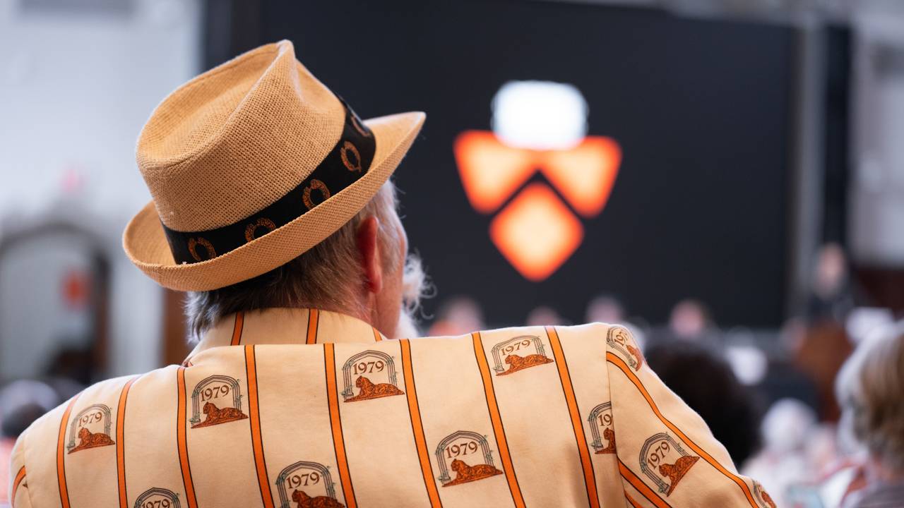 Princeton alumni wearing the 1979 class jacket.