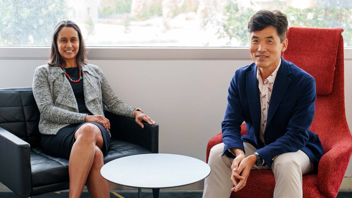 Mala and Sebastian sitting next to each other