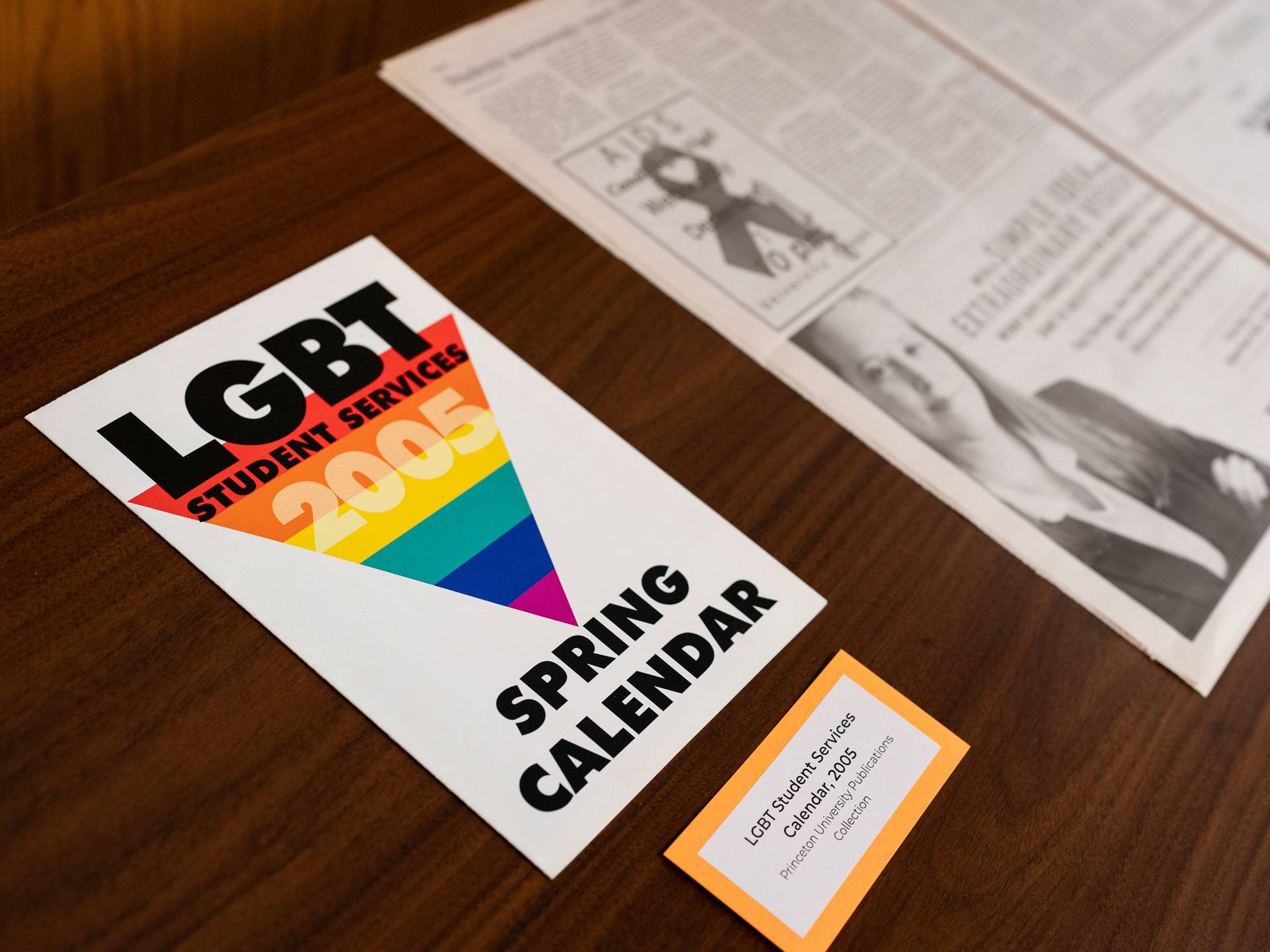 Multi-colored LGBT student services 2005 calendar on a table.