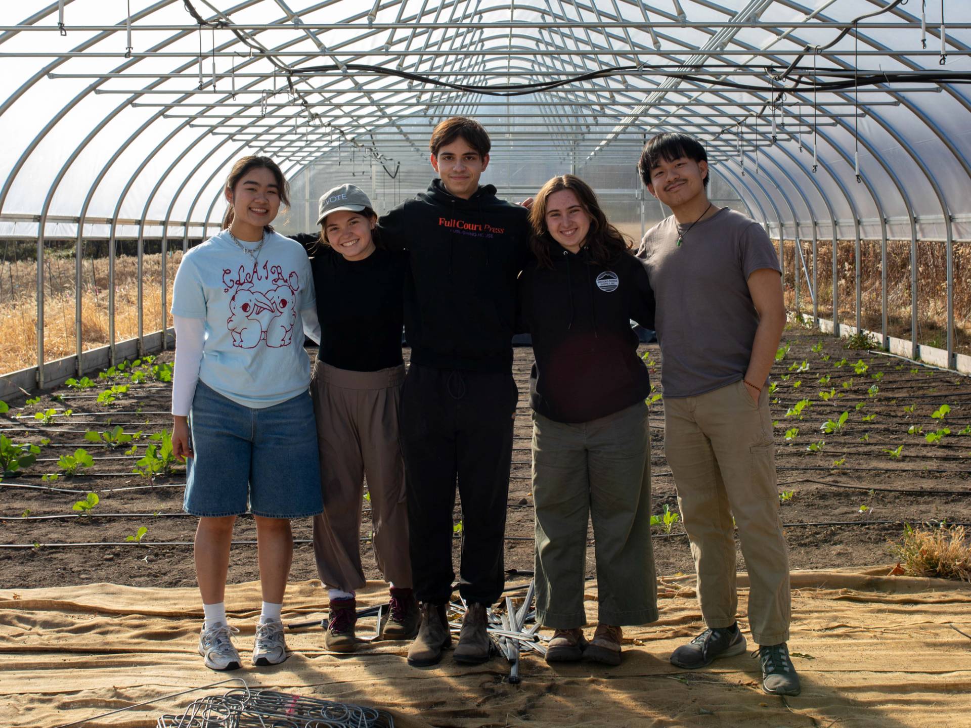 Group of students inside a greenhouse
