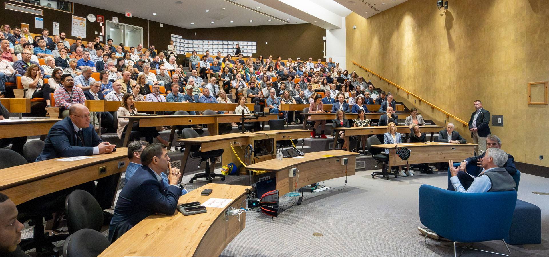 PPPL staff seated in an auditorium for a talk.
