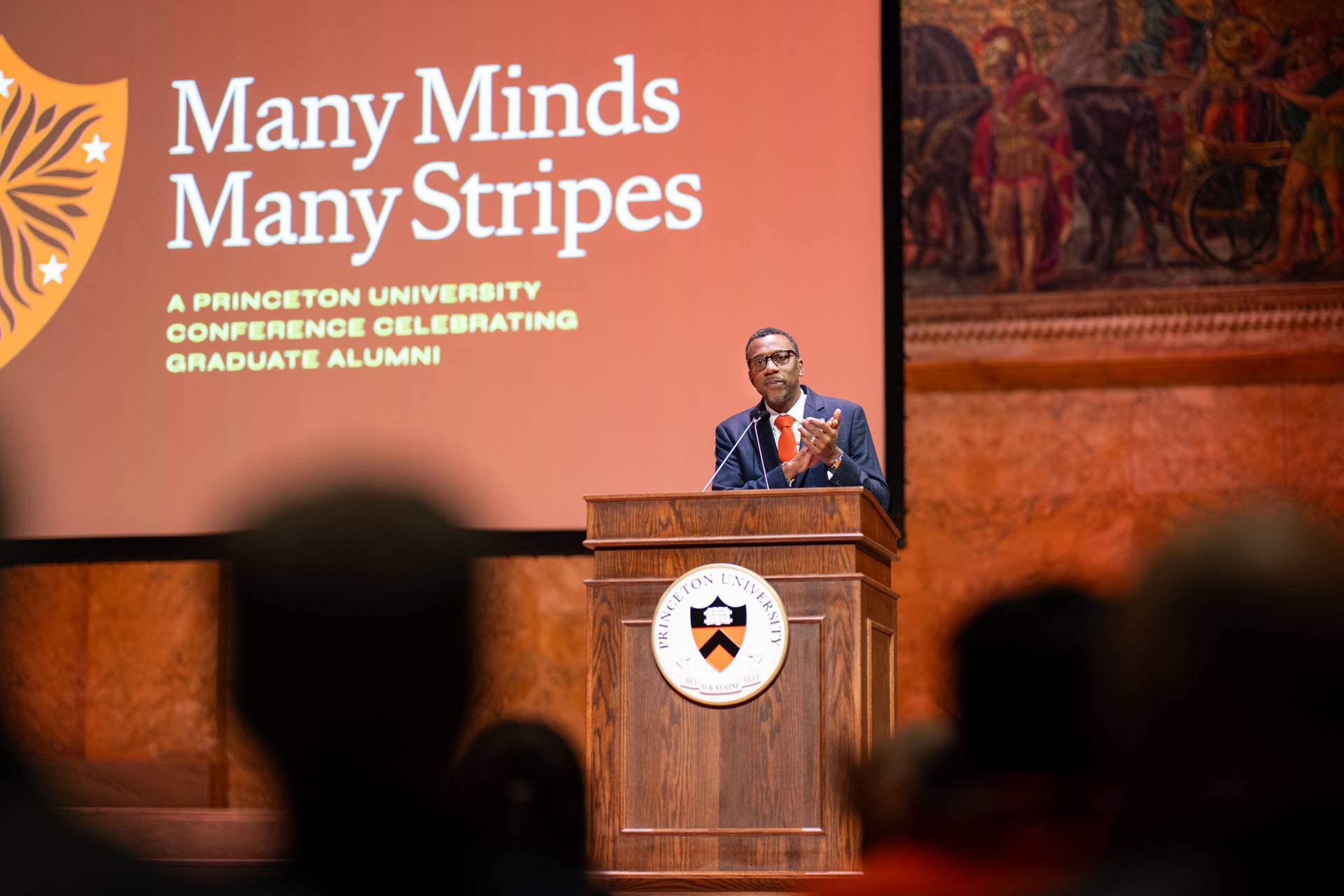 Graduate school dean Rodney Priestley speaks from the podium at Richardson Auditoriaum.