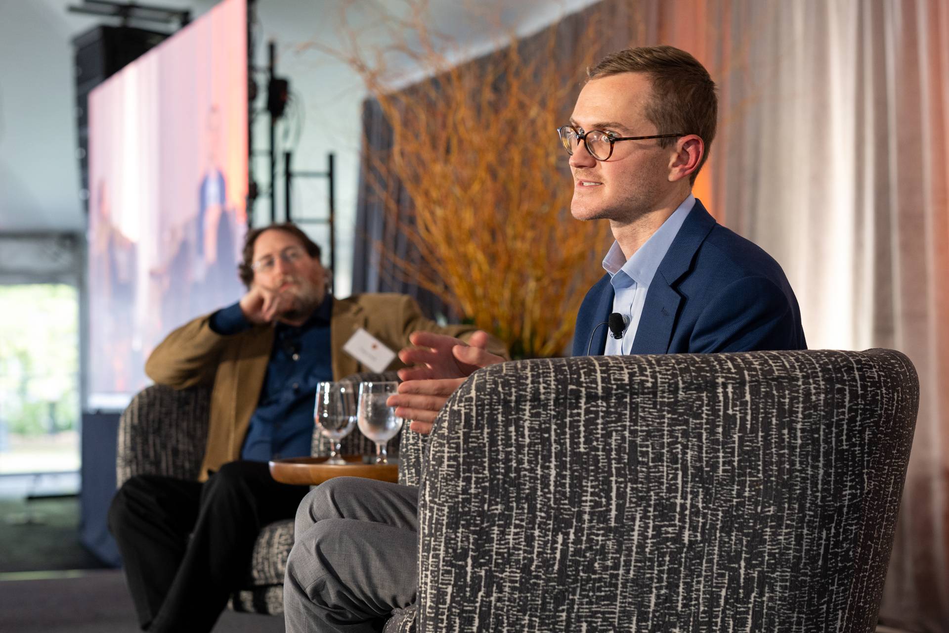 Vice dean for Innovation Craig Arnold (left) interviews graduate alum Justin Silpe.