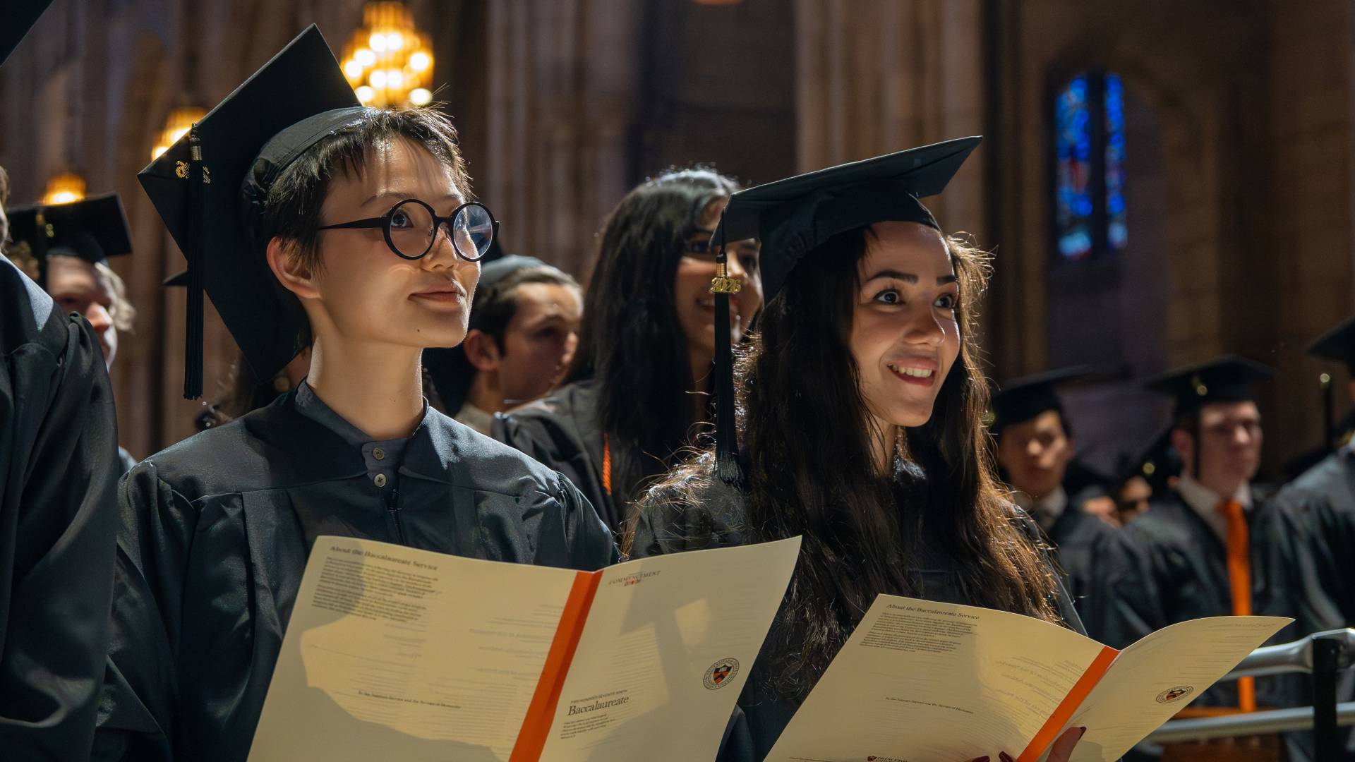 Students sing during the service