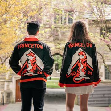 students in princeton jackets facing campus