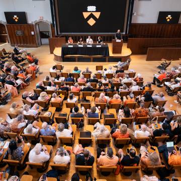 crowd of alumni in room