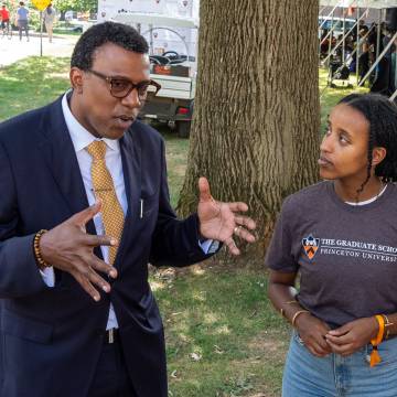 Graduate School Dean Rodney Priestley speaks with students