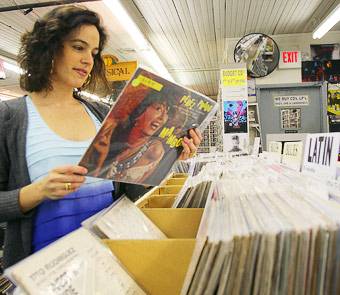 Vazquez looking over records