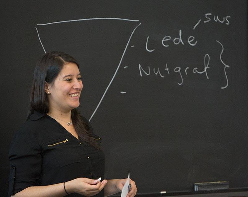 Summer Journalism Program Maria Guardado at board "lede, nutgraf"