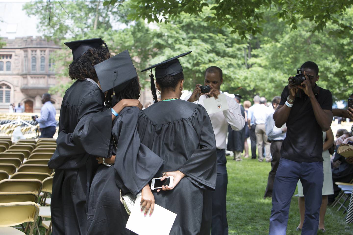 Students posing for parents at Baccalaureate