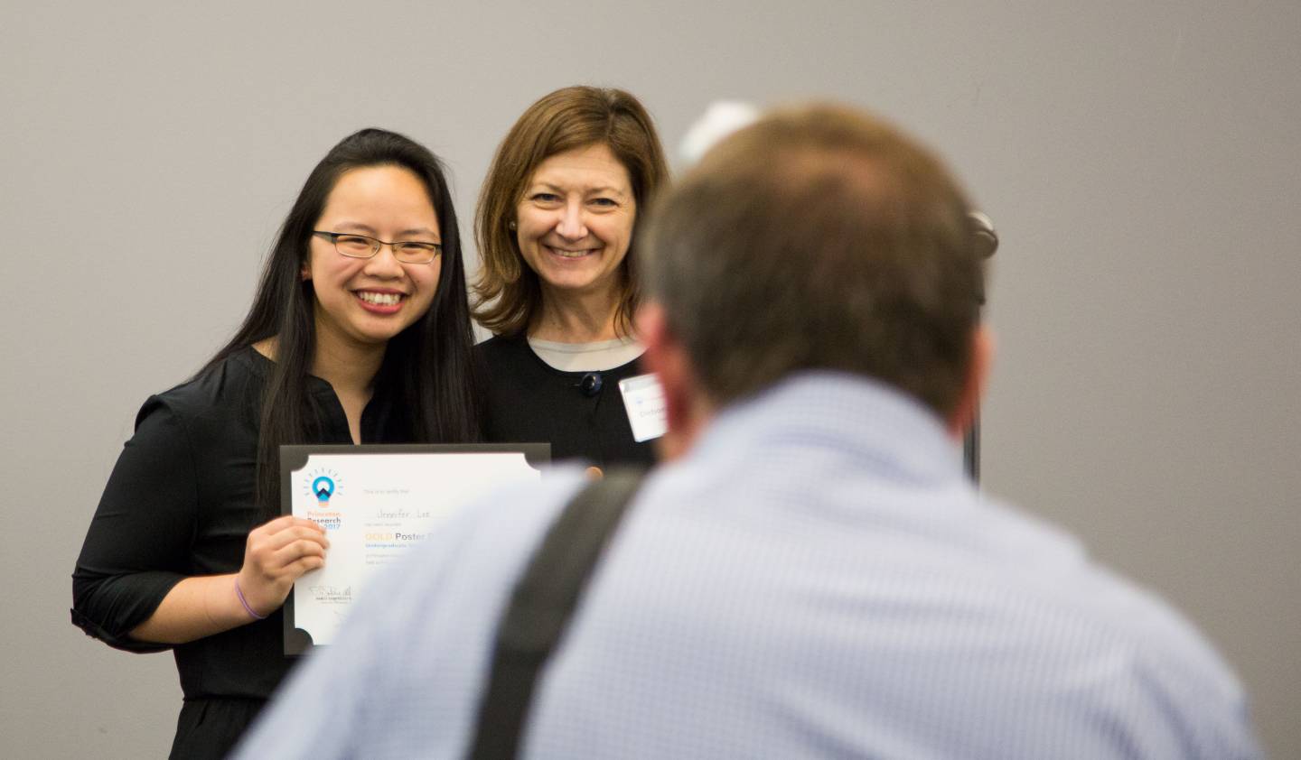 Senior Jennifer Lee posing with Deborah Prentice