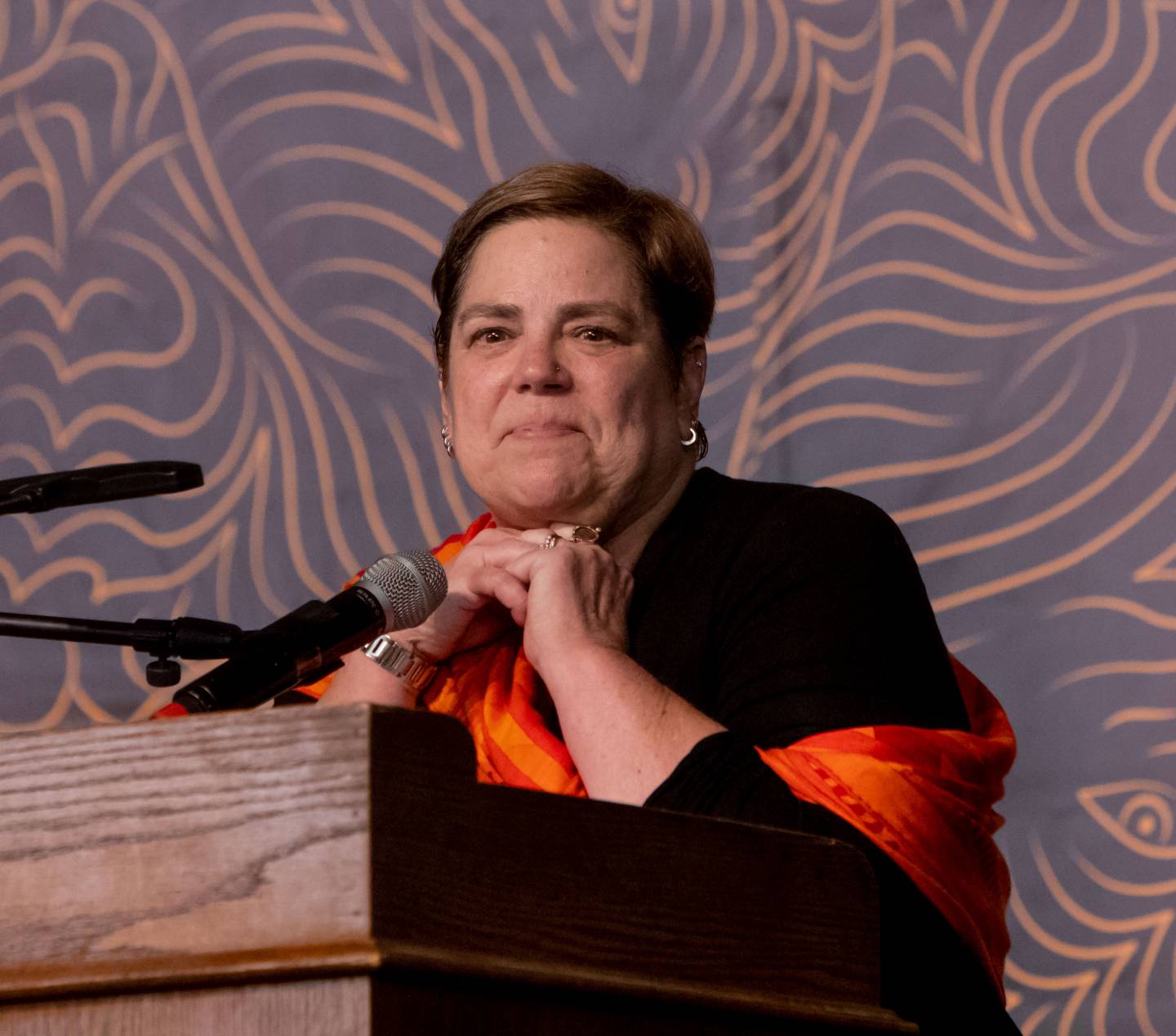 Katie Hall at podium