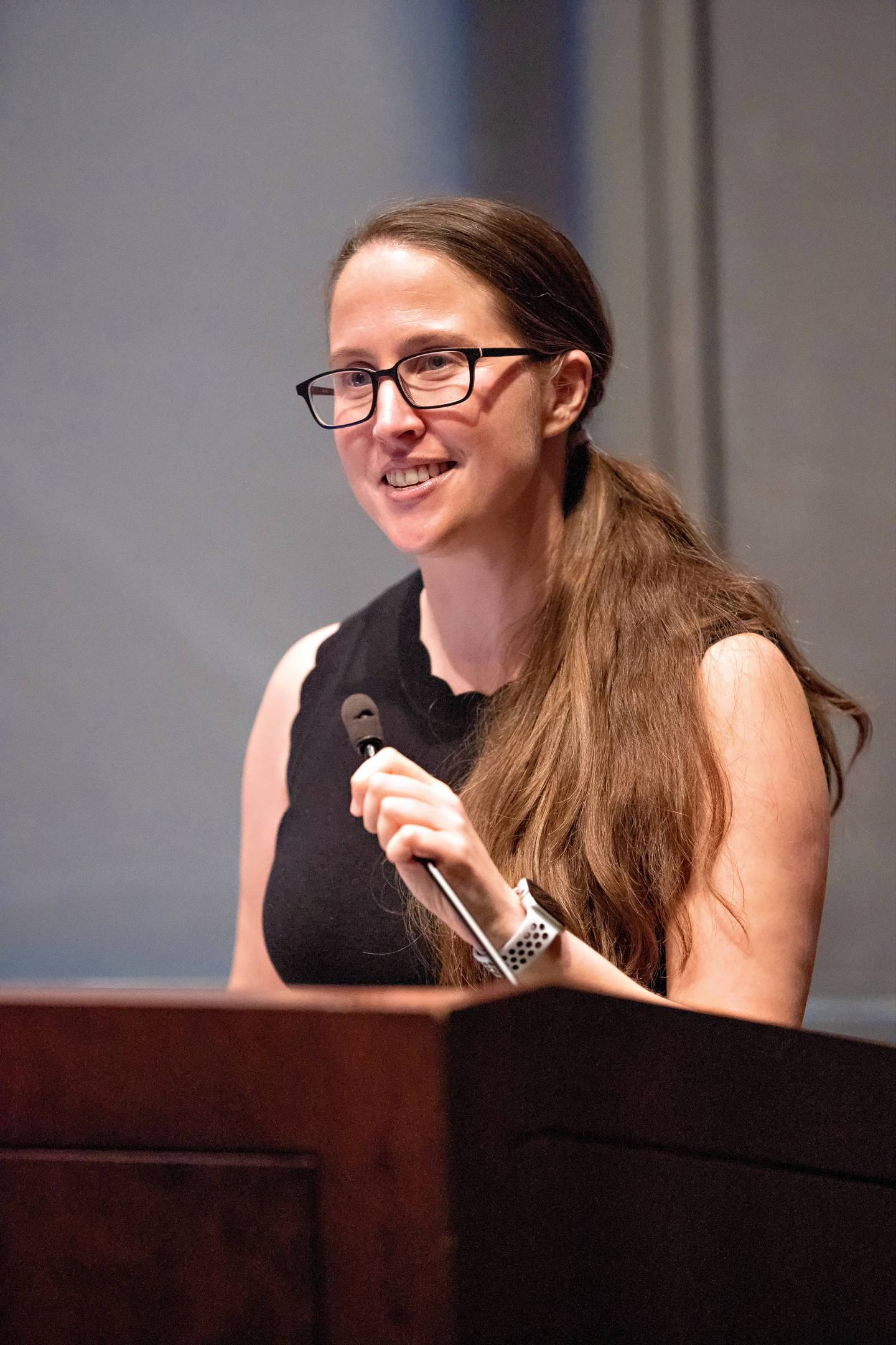 Jennifer Jennings speaks at a podium